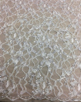 Ivory Beaded Floral Lace — featuring scalloped edges, floral motifs and hand-beading, 130cm wide