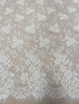 Ivory Corded Beaded Floral Lace — featuring scalloped edges, eyelash detail and a corded texture, in nylon, 140cm wide