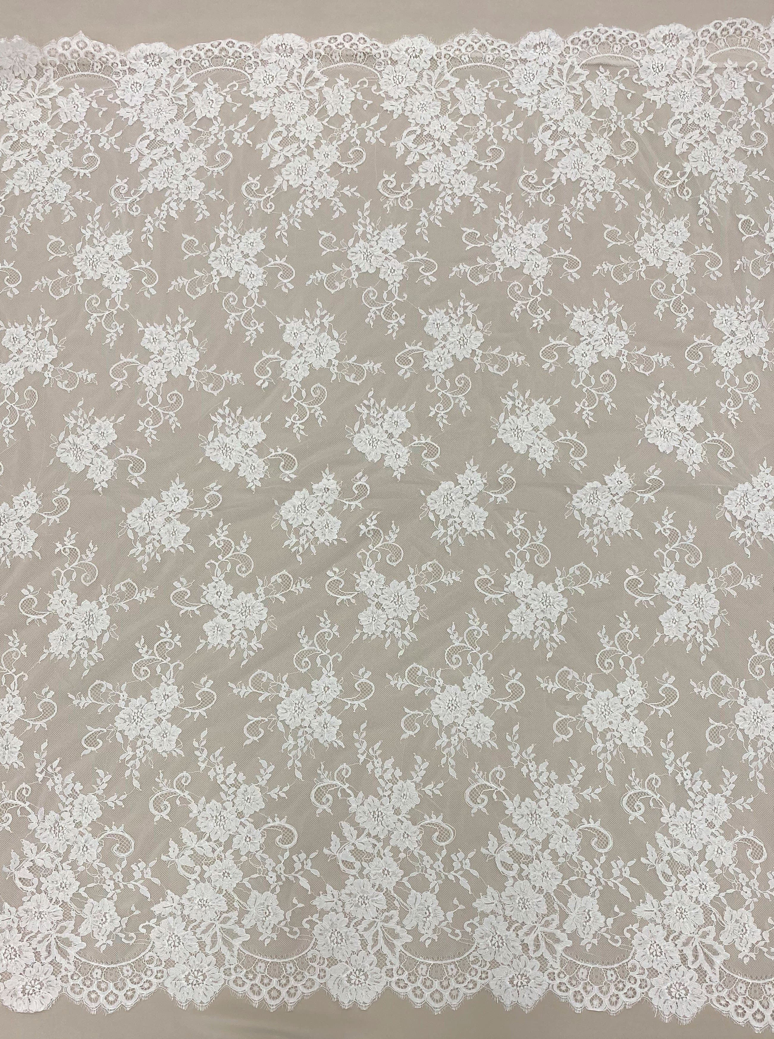 Ivory Corded Floral Lace — featuring scalloped edges, eyelash detail and floral motifs, 140cm wide