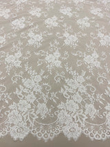 Ivory Corded Floral Lace — featuring scalloped edges, eyelash detail and floral motifs, 140cm wide