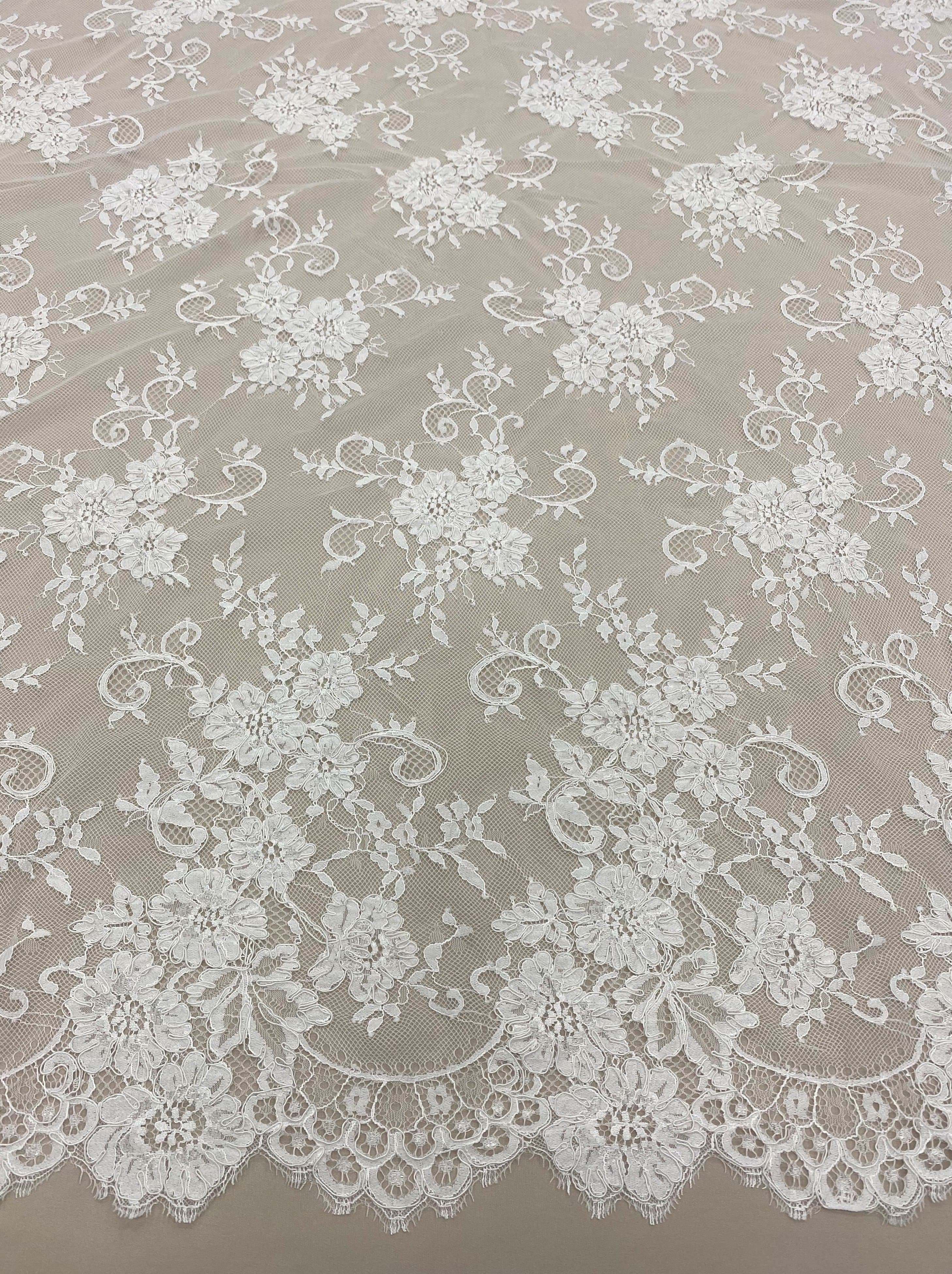 Ivory Corded Floral Lace — featuring scalloped edges, eyelash detail and floral motifs, 140cm wide
