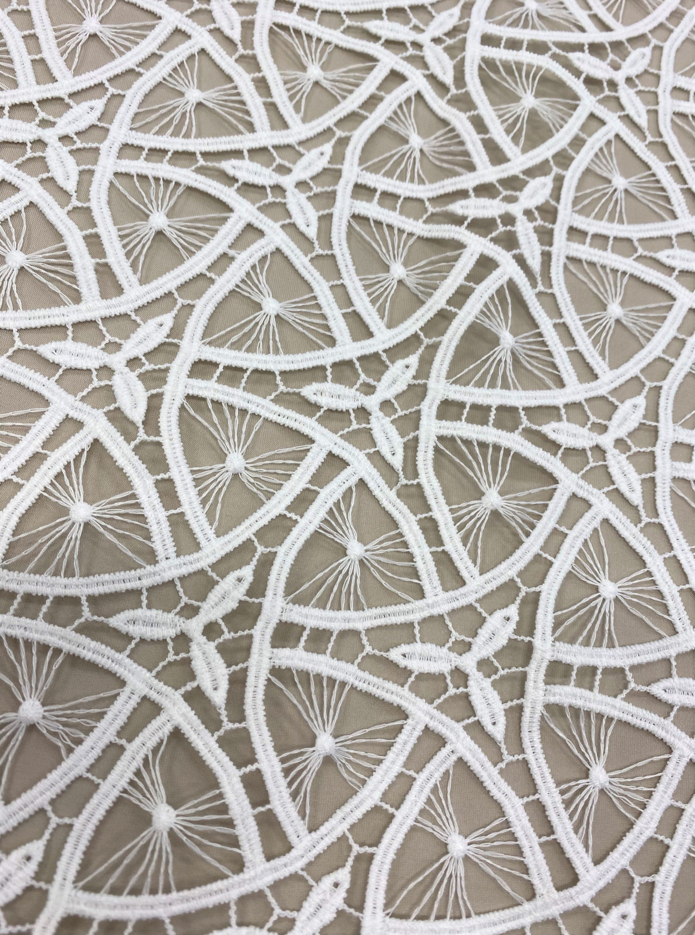 Ivory Guipure Lace — featuring Guipure motifs and geometric motifs, 120cm wide