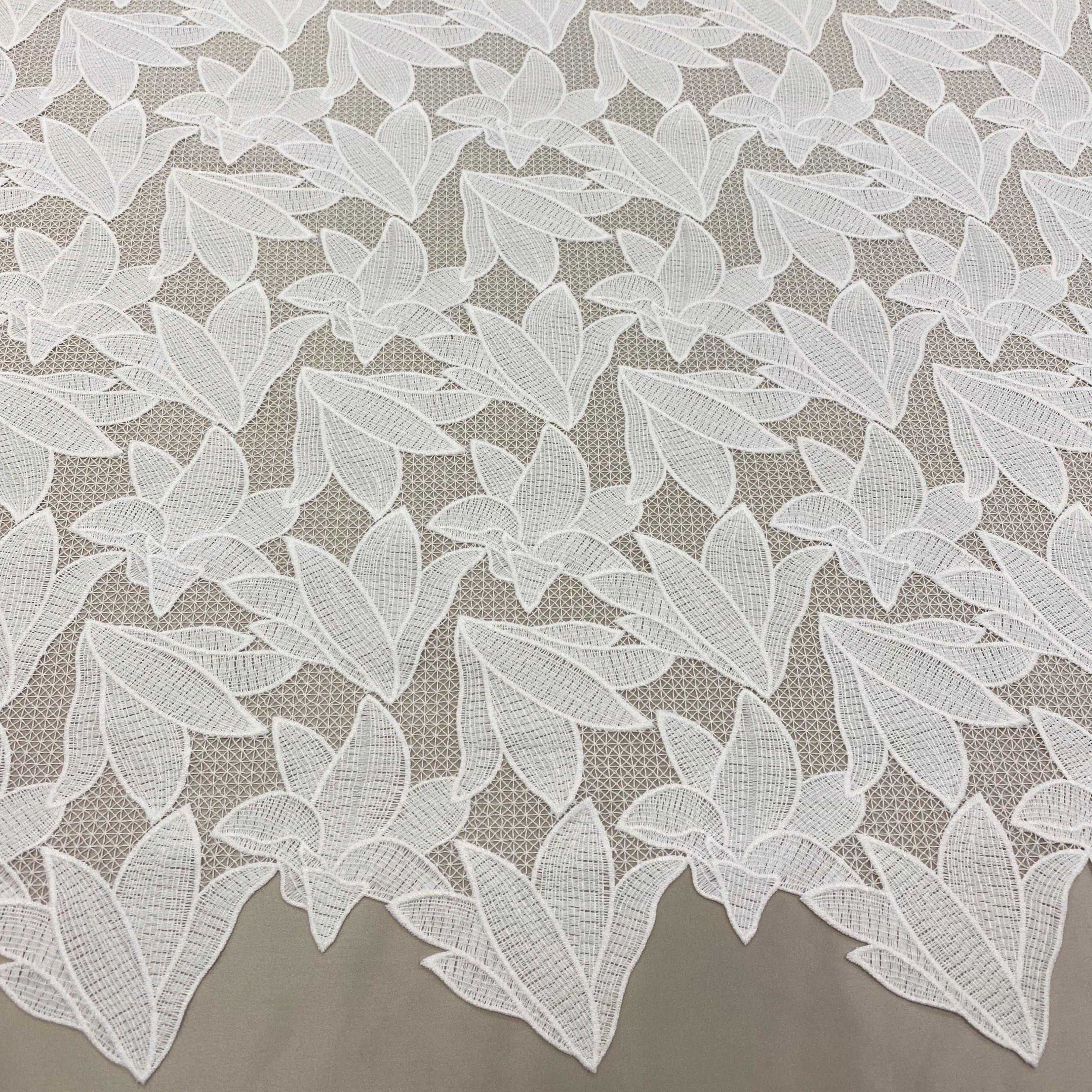 Ivory Floral Lace — featuring floral motifs and geometric motifs, 100cm wide