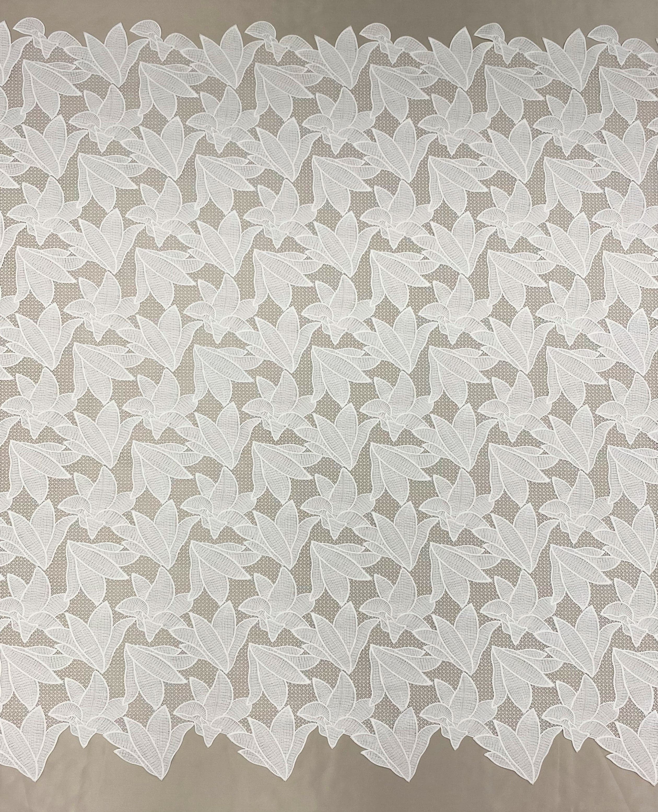 Ivory Floral Lace — featuring floral motifs and geometric motifs, 100cm wide