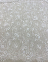Ivory Fine Lace — featuring scalloped edges and floral motifs, in viscose and nylon, 140cm wide