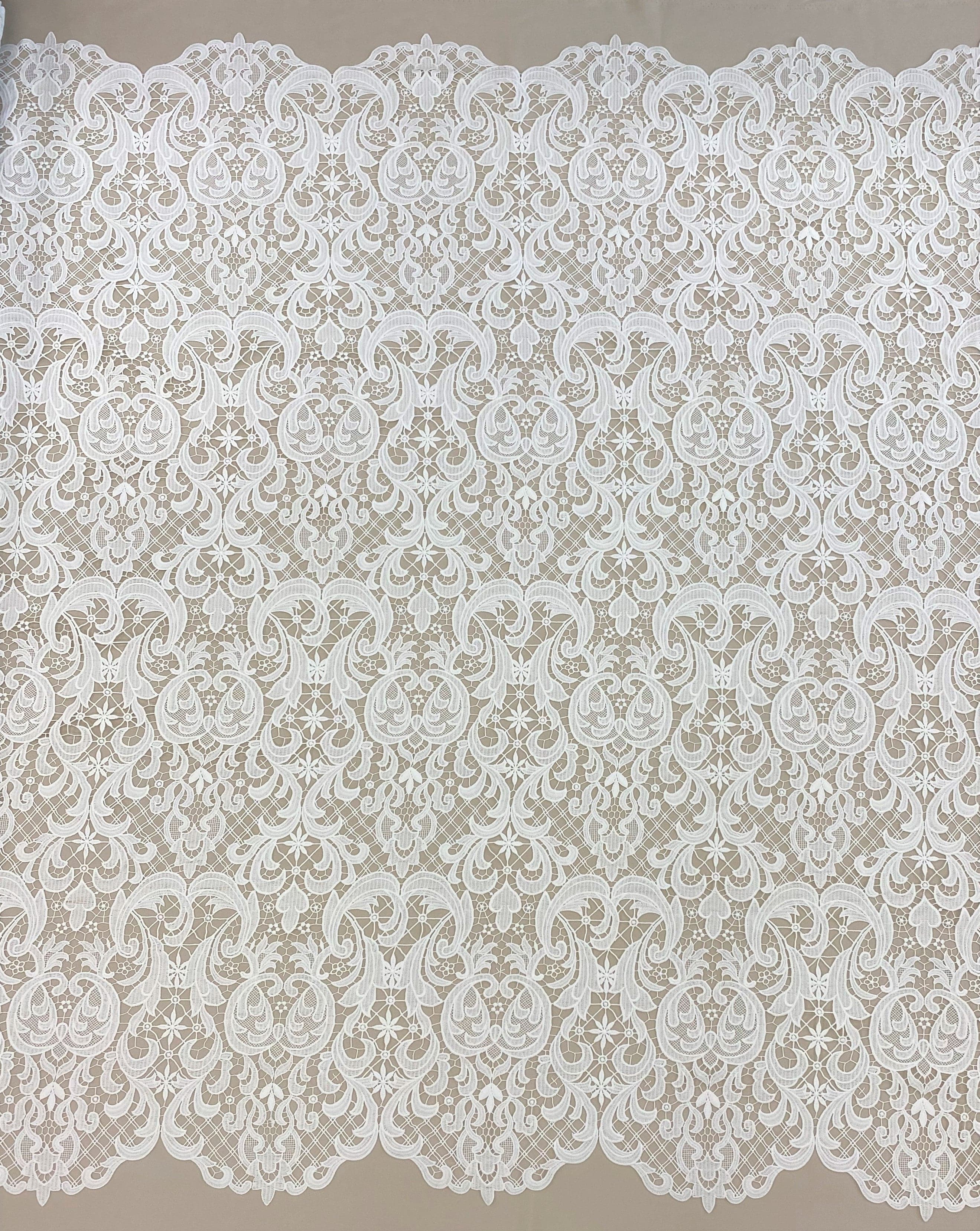 Ivory Filigree Guipure Lace — featuring scalloped edges, filigree scrollwork and paisley motifs, 120cm wide