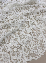 Ivory Filigree Guipure Lace — featuring scalloped edges, filigree scrollwork and paisley motifs, 120cm wide