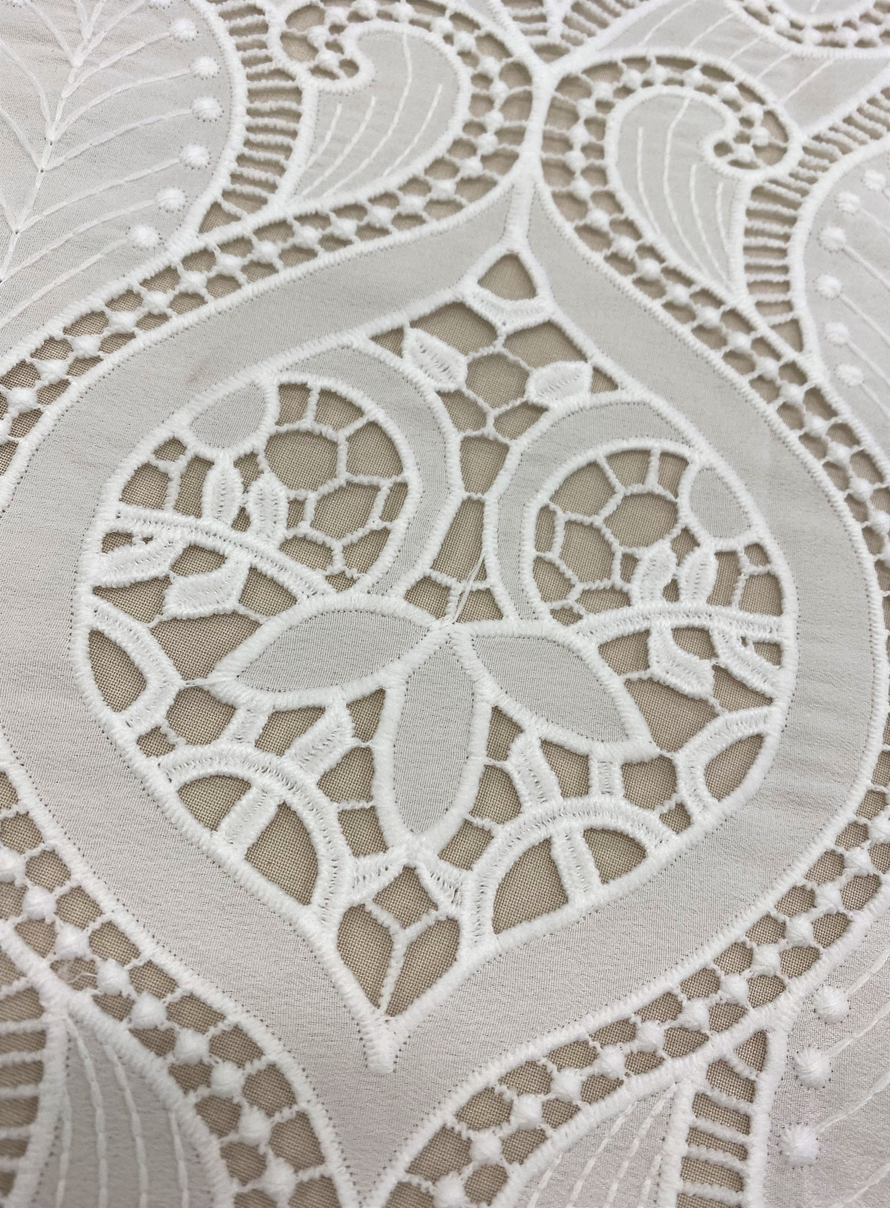 Ivory Embroidered Cutwork — featuring scalloped edges, eyelash detail and Guipure motifs, 100% polyester, 120cm wide