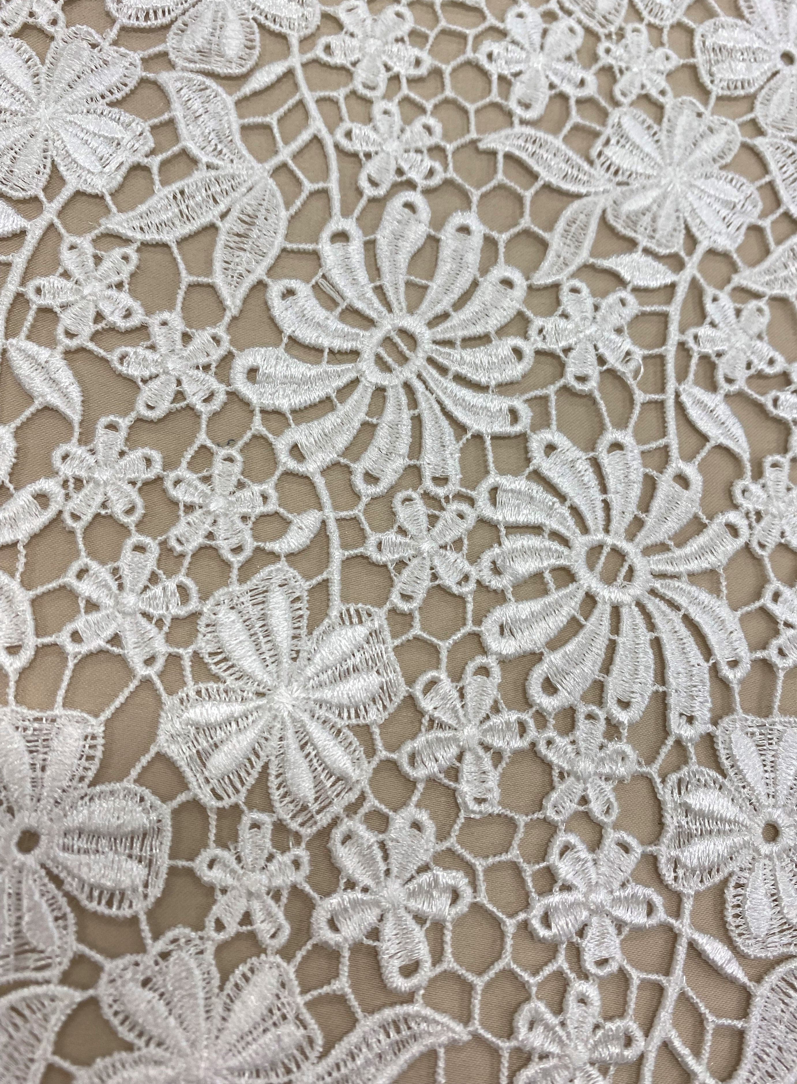 Ivory Floral Guipure Lace — featuring floral motifs and Guipure motifs, 130cm wide