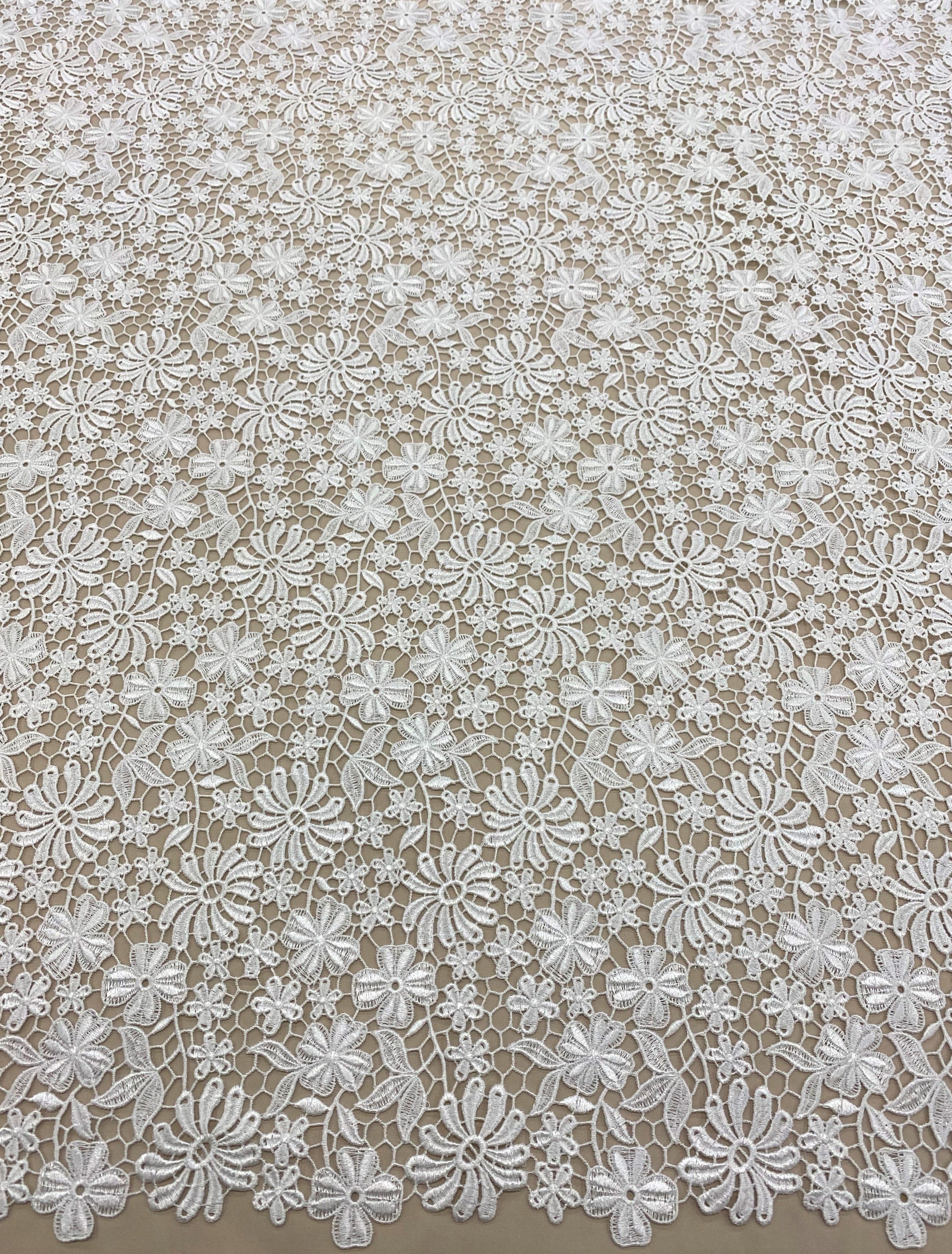 Ivory Floral Guipure Lace — featuring floral motifs and Guipure motifs, 130cm wide