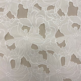 Ivory Embroidered Cutwork — featuring a floral cutwork design, 100% polyester, 130cm wide