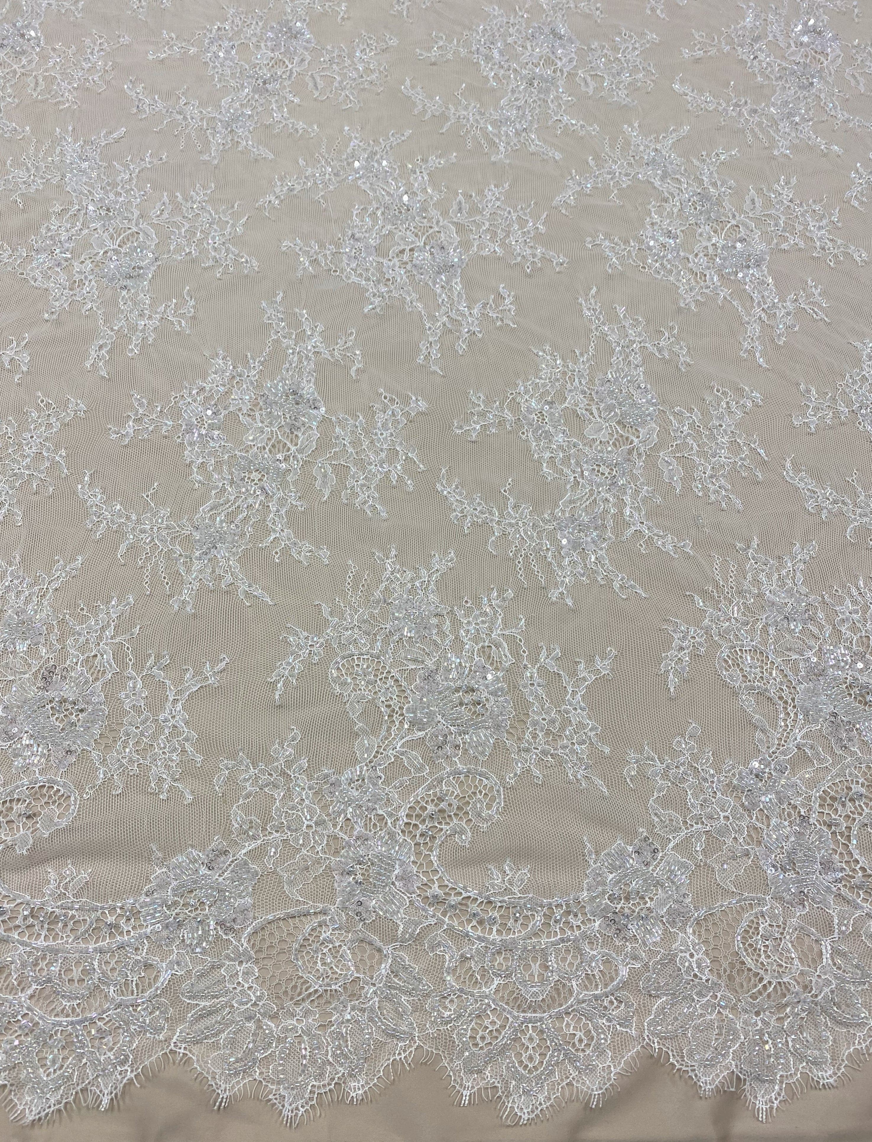 White Beaded Fine Lace — featuring scalloped edges, eyelash detail and floral motifs, in nylon, 150cm wide