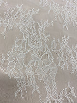 Ivory Fine Floral Lace — featuring scalloped edges, eyelash detail and floral motifs, 130cm wide