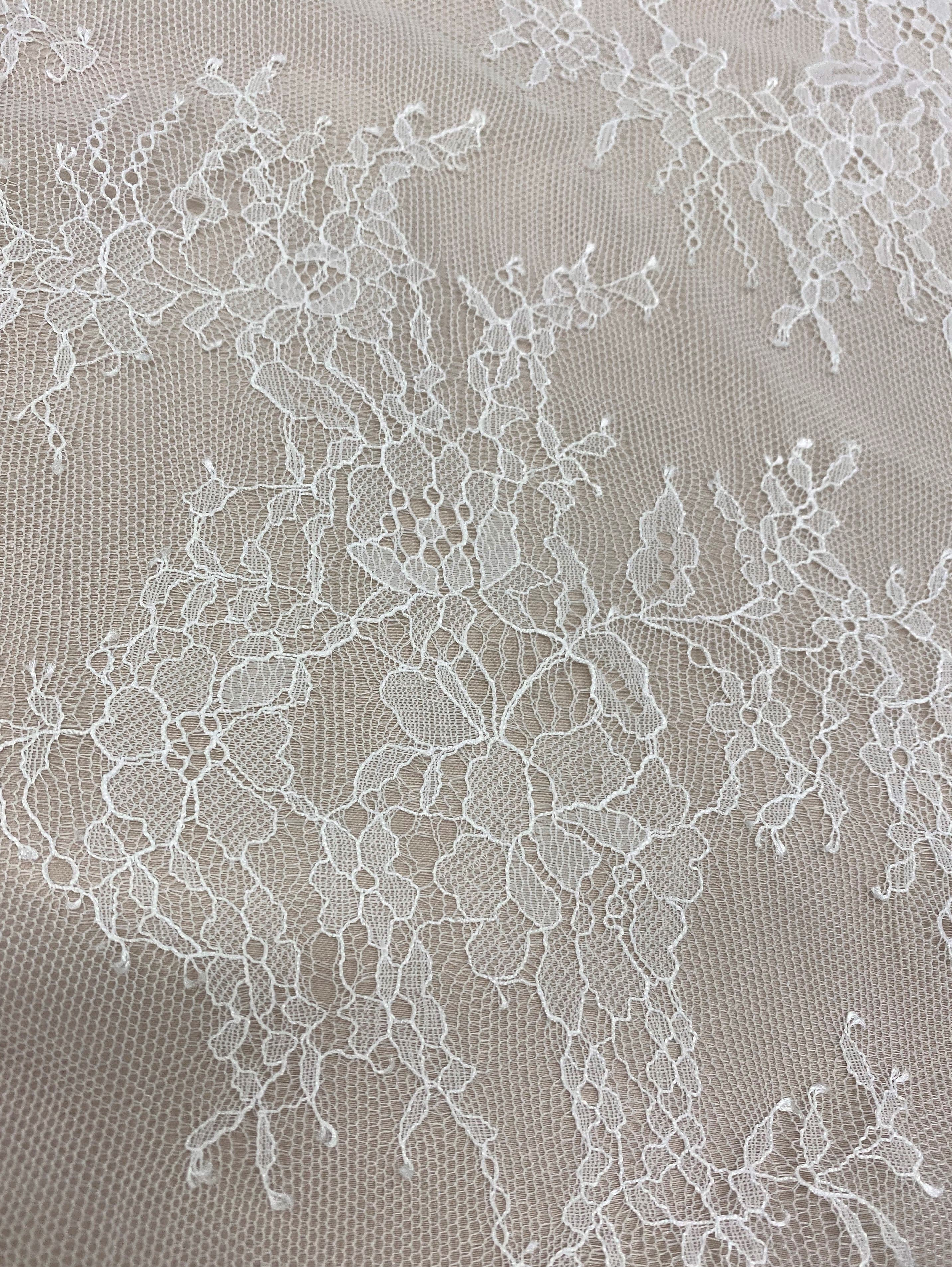 White Fine Floral Lace — featuring scalloped edges, eyelash detail and floral motifs, 130cm wide