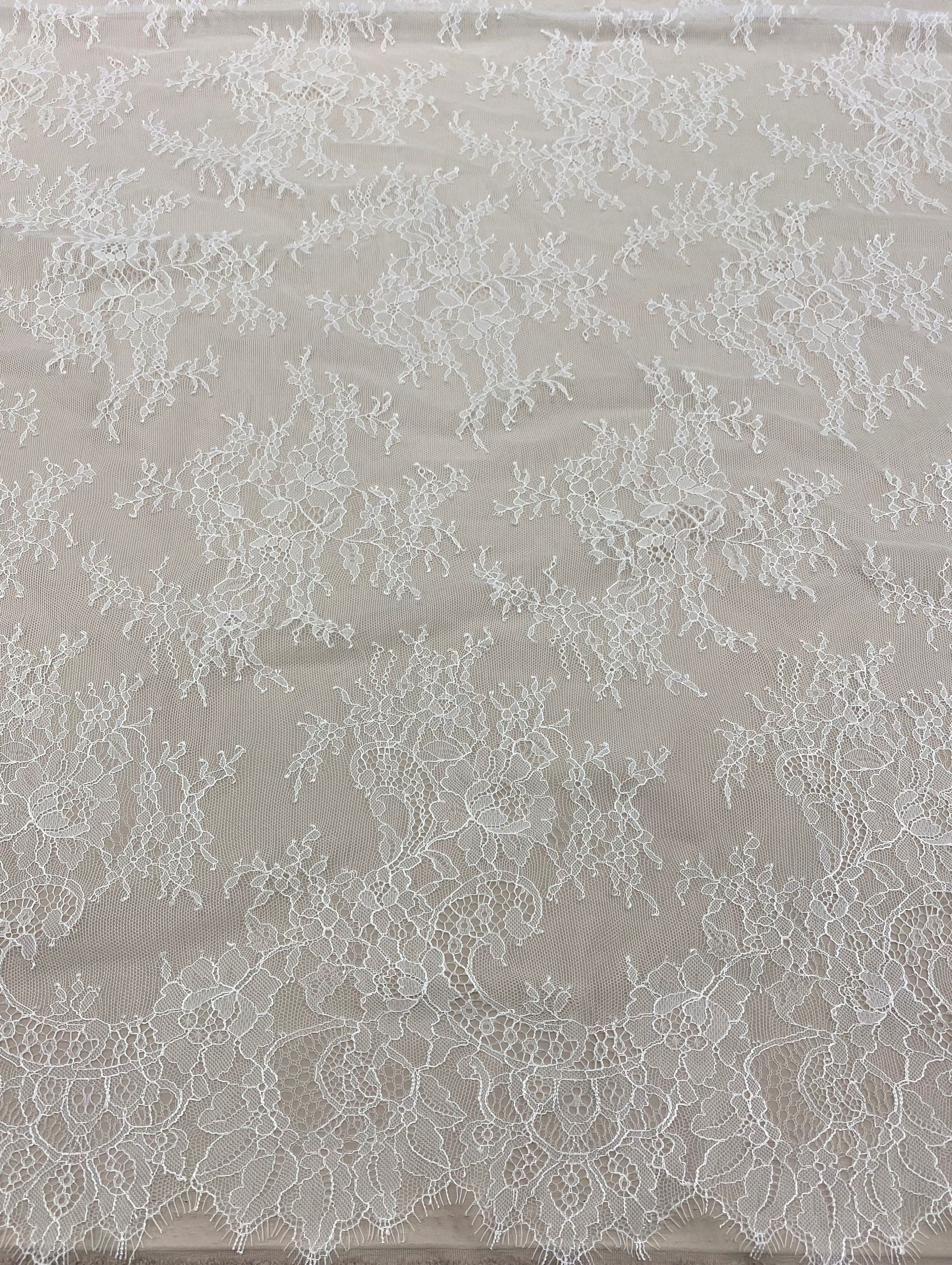 White Fine Floral Lace — featuring scalloped edges, eyelash detail and floral motifs, 130cm wide