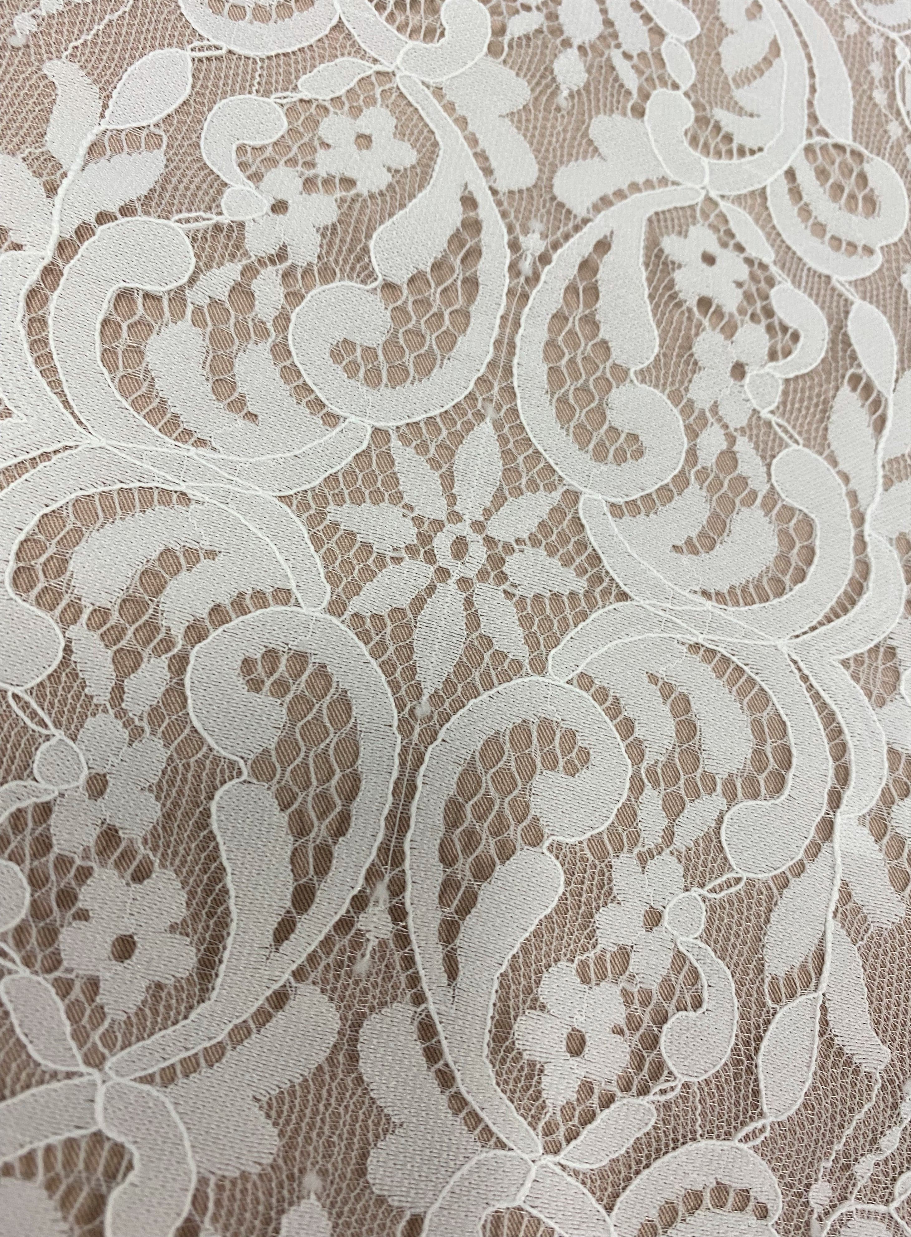 Light Ivory Corded Fine Lace — featuring scalloped edges, eyelash detail, arabesque motifs and a corded texture, 130cm wide