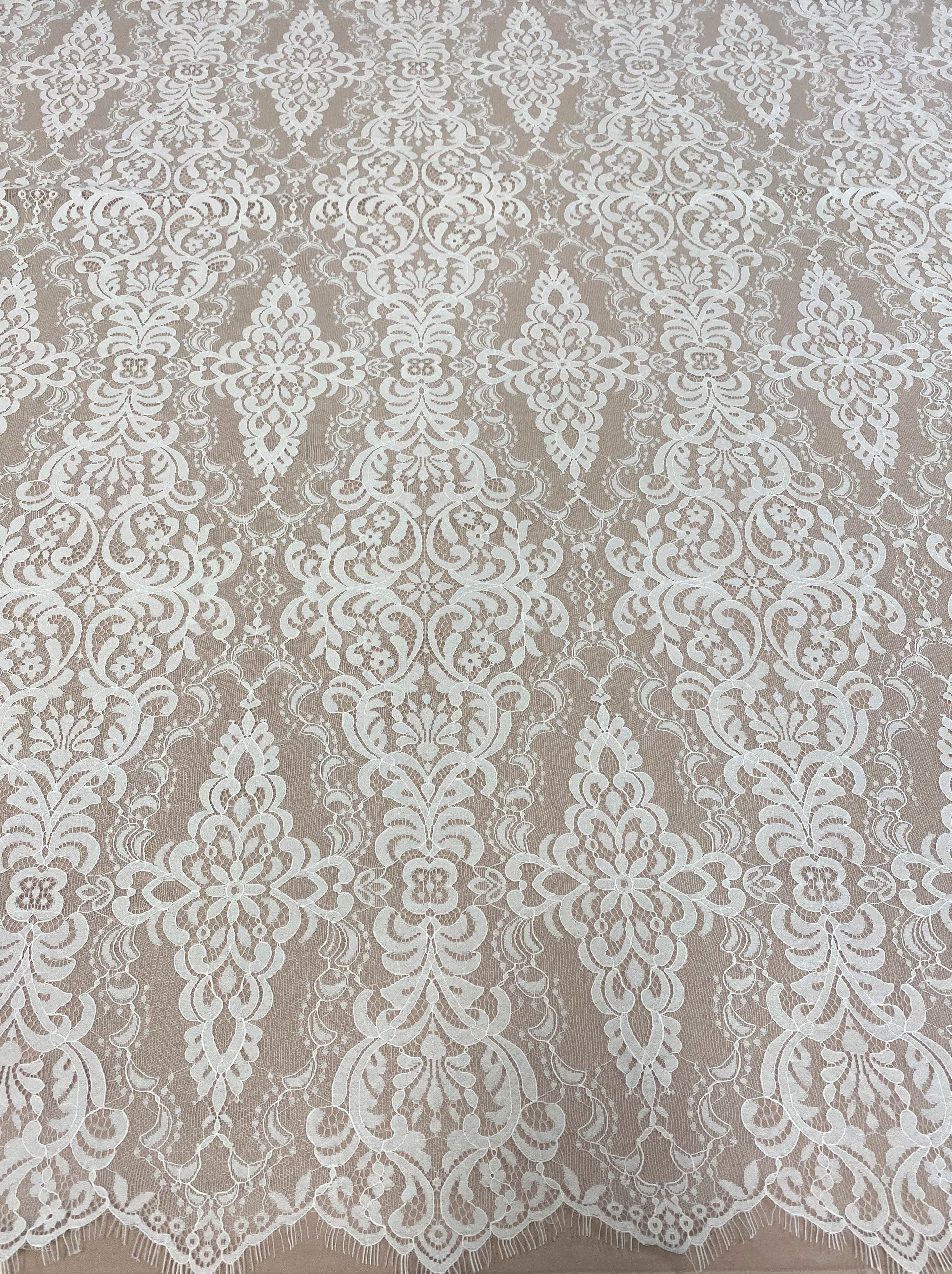 Light Ivory Corded Fine Lace — featuring scalloped edges, eyelash detail, arabesque motifs and a corded texture, 130cm wide