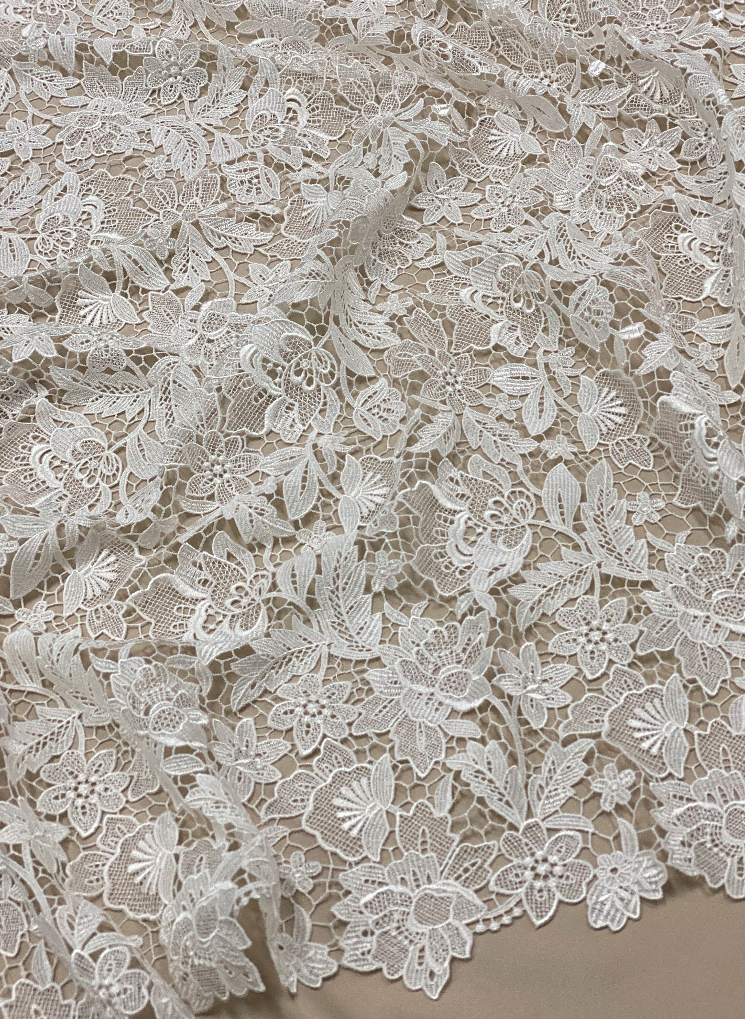 Ivory Floral Guipure Lace — featuring floral motifs and Guipure motifs, in nylon, 130cm wide