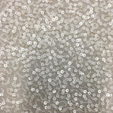 Ivory Sequin Georgette — heavily sequined on a 100% silk georgette base, with sequins running the length, 110cm wide