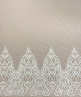 Ivory Embroidered Border Tulle — featuring a border design, 30% nylon 30% rayon 40% polyester, 130cm wide