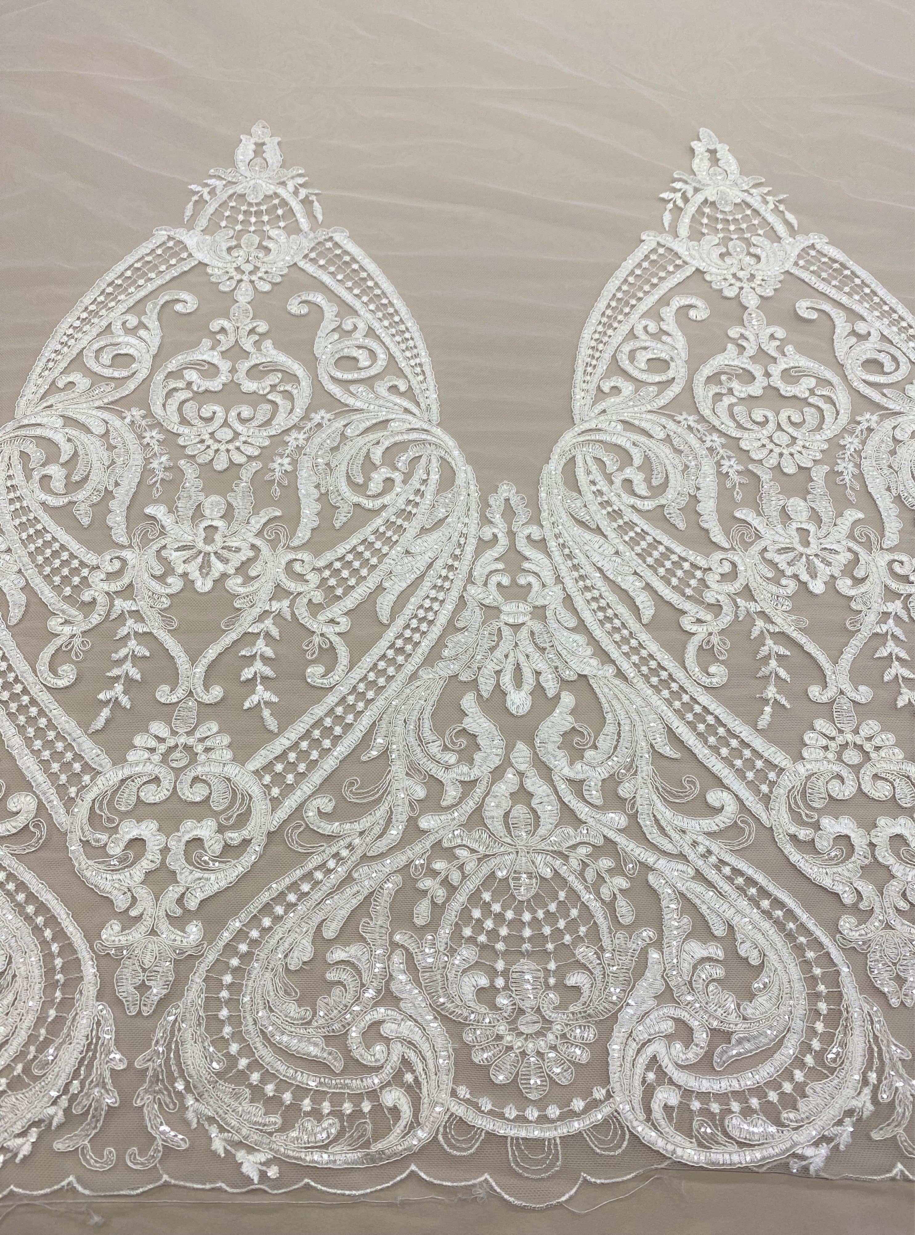 Ivory Embroidered Border Tulle — featuring a border design, 30% nylon 30% rayon 40% polyester, 130cm wide