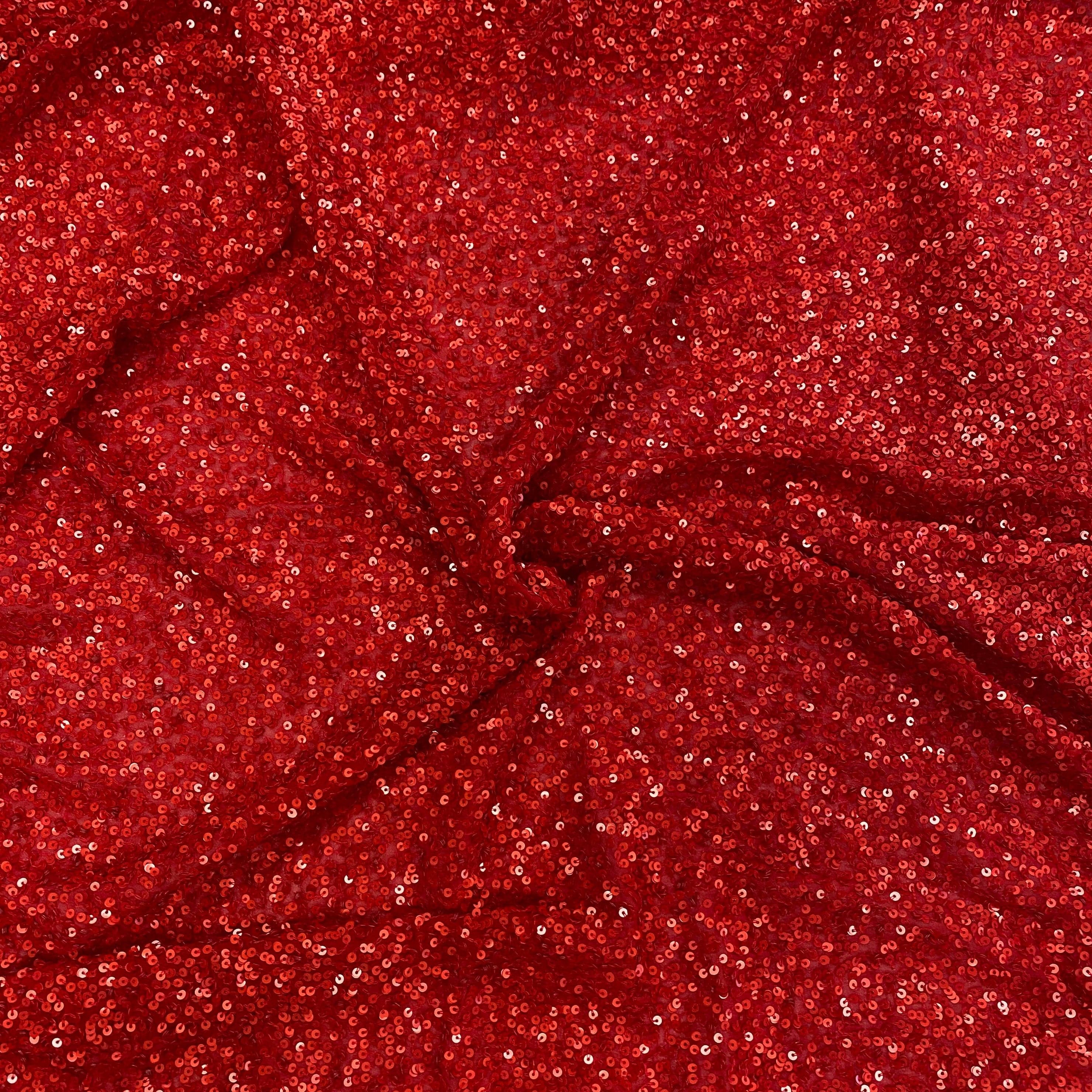 Red Sequin Georgette — heavily sequined on a 100% silk georgette base, with sequins running the length, 110cm wide