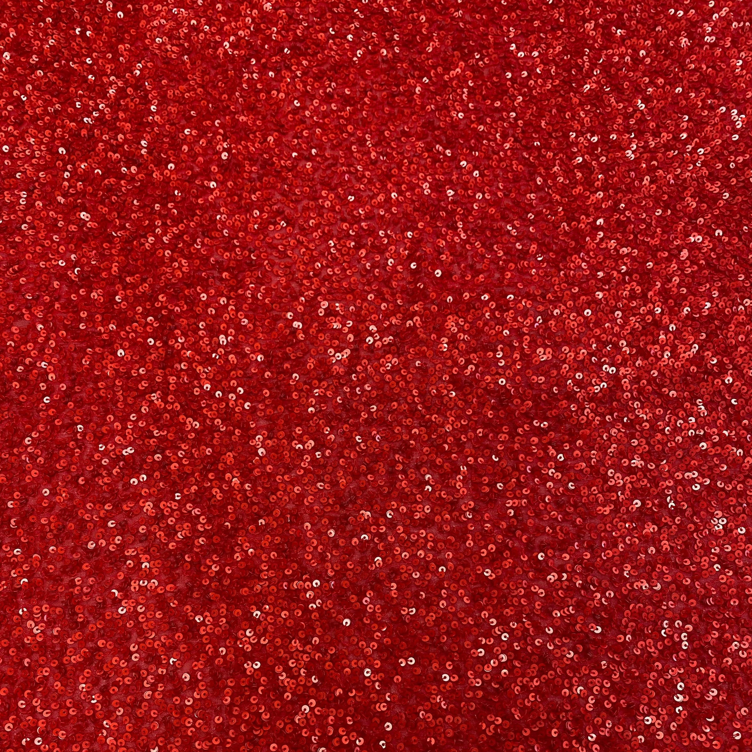 Red Sequin Georgette — heavily sequined on a 100% silk georgette base, with sequins running the length, 110cm wide