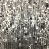 Silver Sequin Georgette — featuring rows of sequins running the length, with a soft mid-weight drape