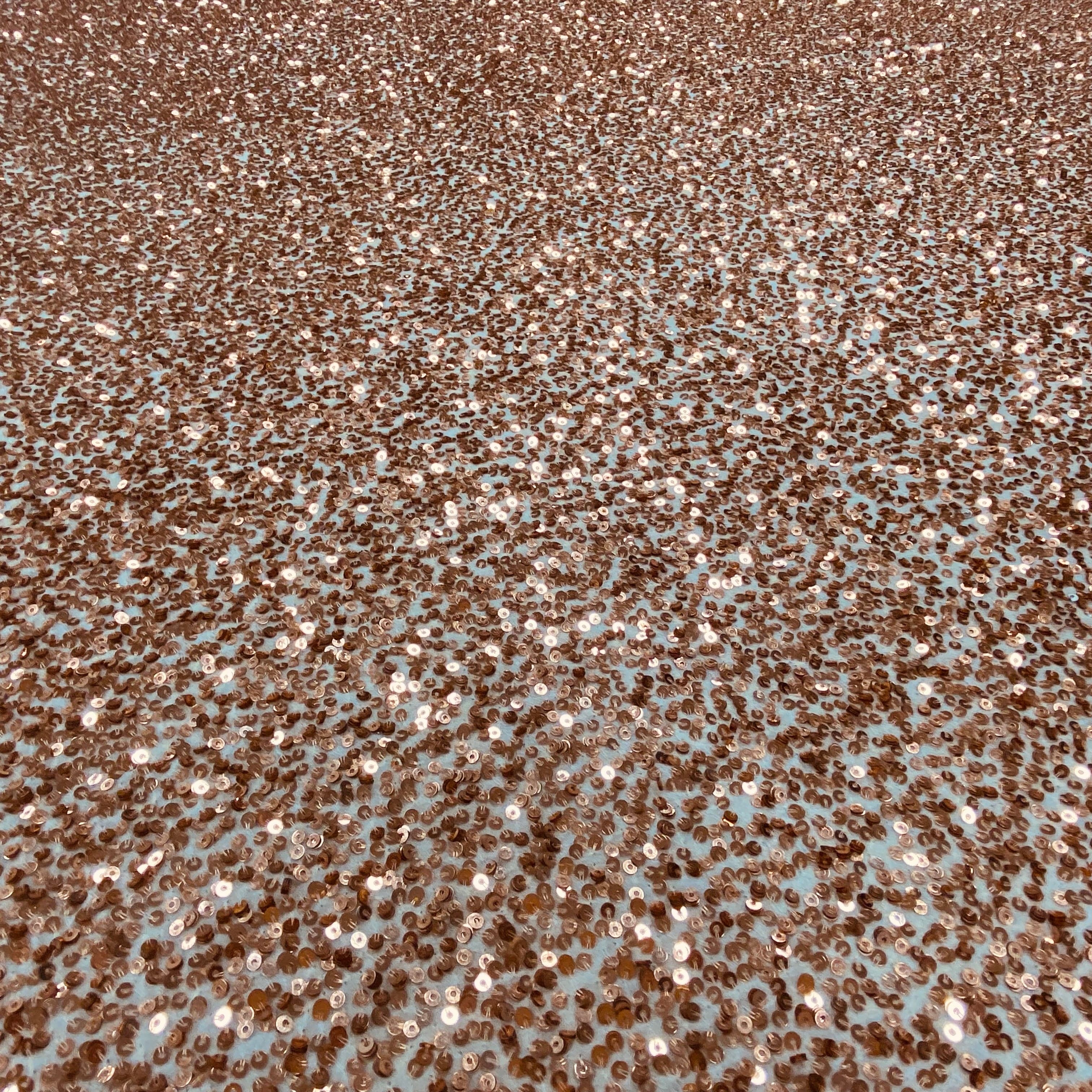 Rose Gold Sequin Georgette — heavily sequined on a 100% silk georgette base, with sequins running the length, 110cm wide
