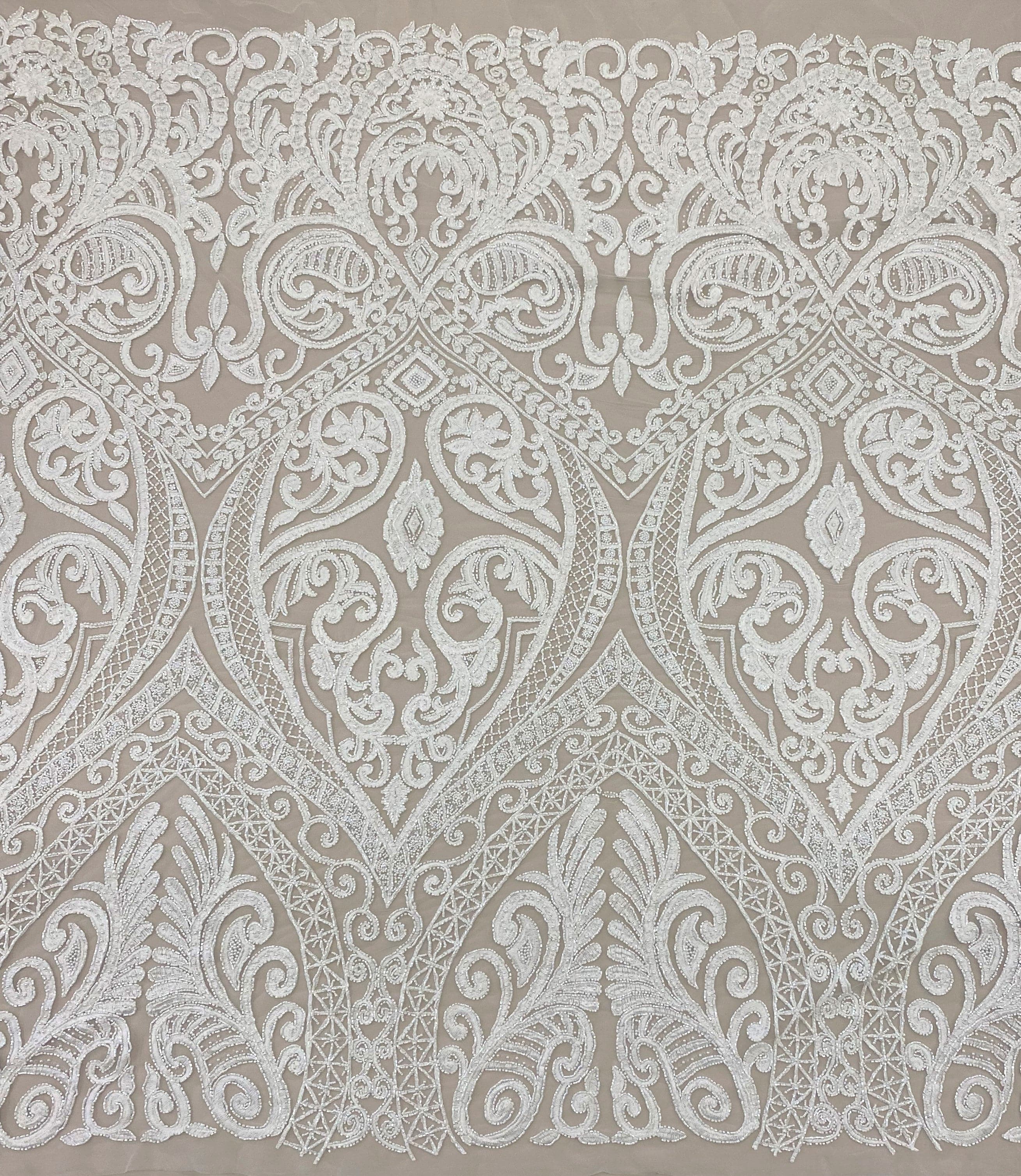 Ivory Embroidered Tulle — featuring scalloped edges and hand-beading, 50% nylon 50% rayon, 135cm wide