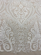 Ivory Embroidered Tulle — featuring scalloped edges and hand-beading, 50% nylon 50% rayon, 135cm wide