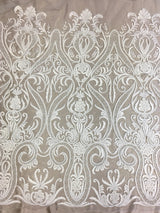 Ivory Beaded Tulle — featuring hand-beading, 100% nylon, 130cm wide