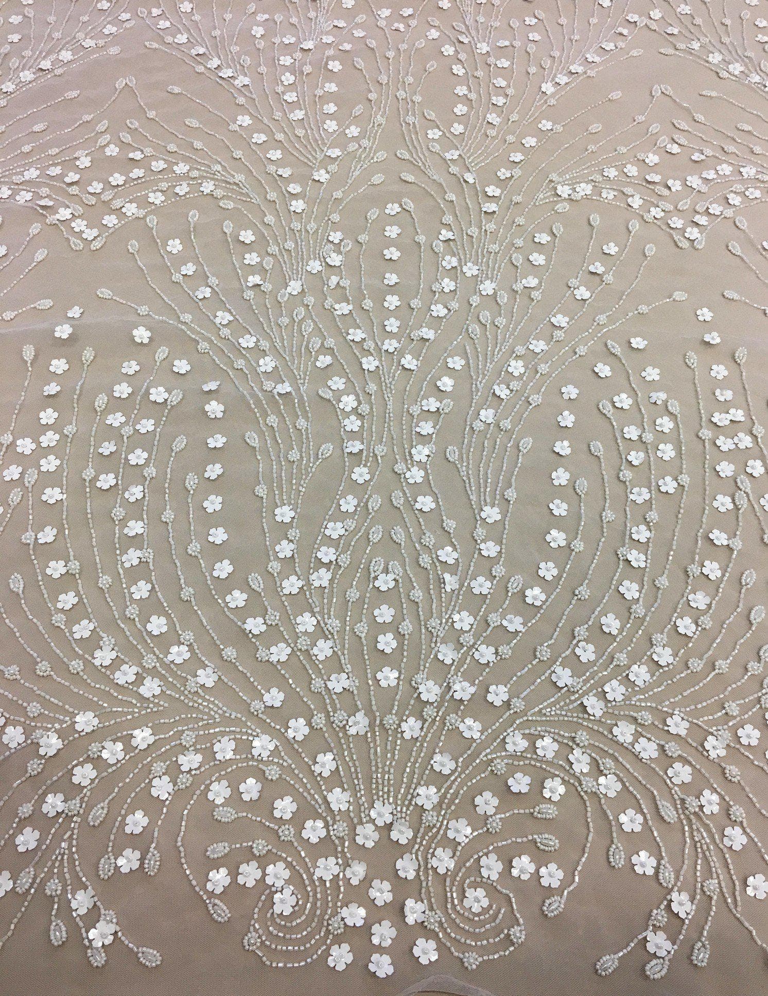 Ivory Floral Beaded Tulle — featuring hand-beading and sequins, 100% nylon, 140cm wide