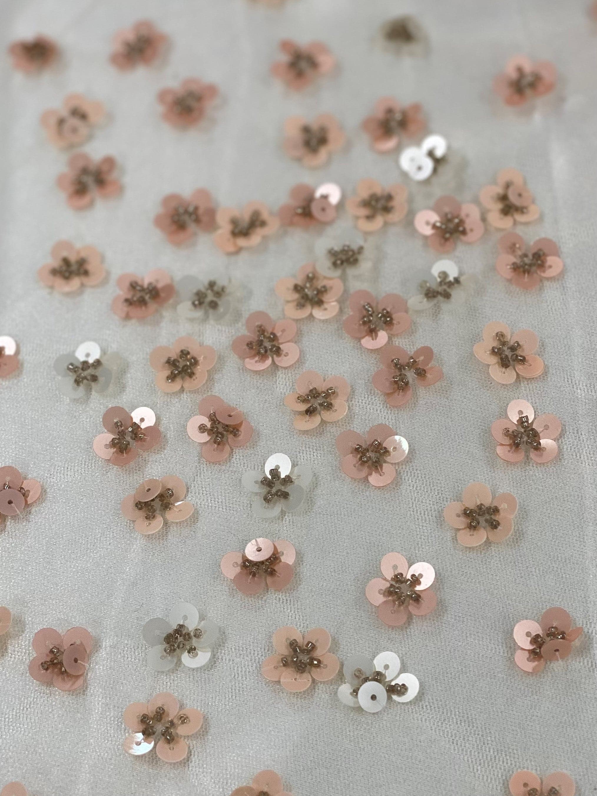 Ivory / Pink Floral Sequin Tulle — featuring hand-beading and sequins, 100% nylon, 110cm wide