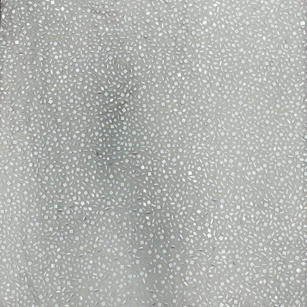 Ivory Sequin Tulle — featuring sequins, 100% nylon, 110cm wide