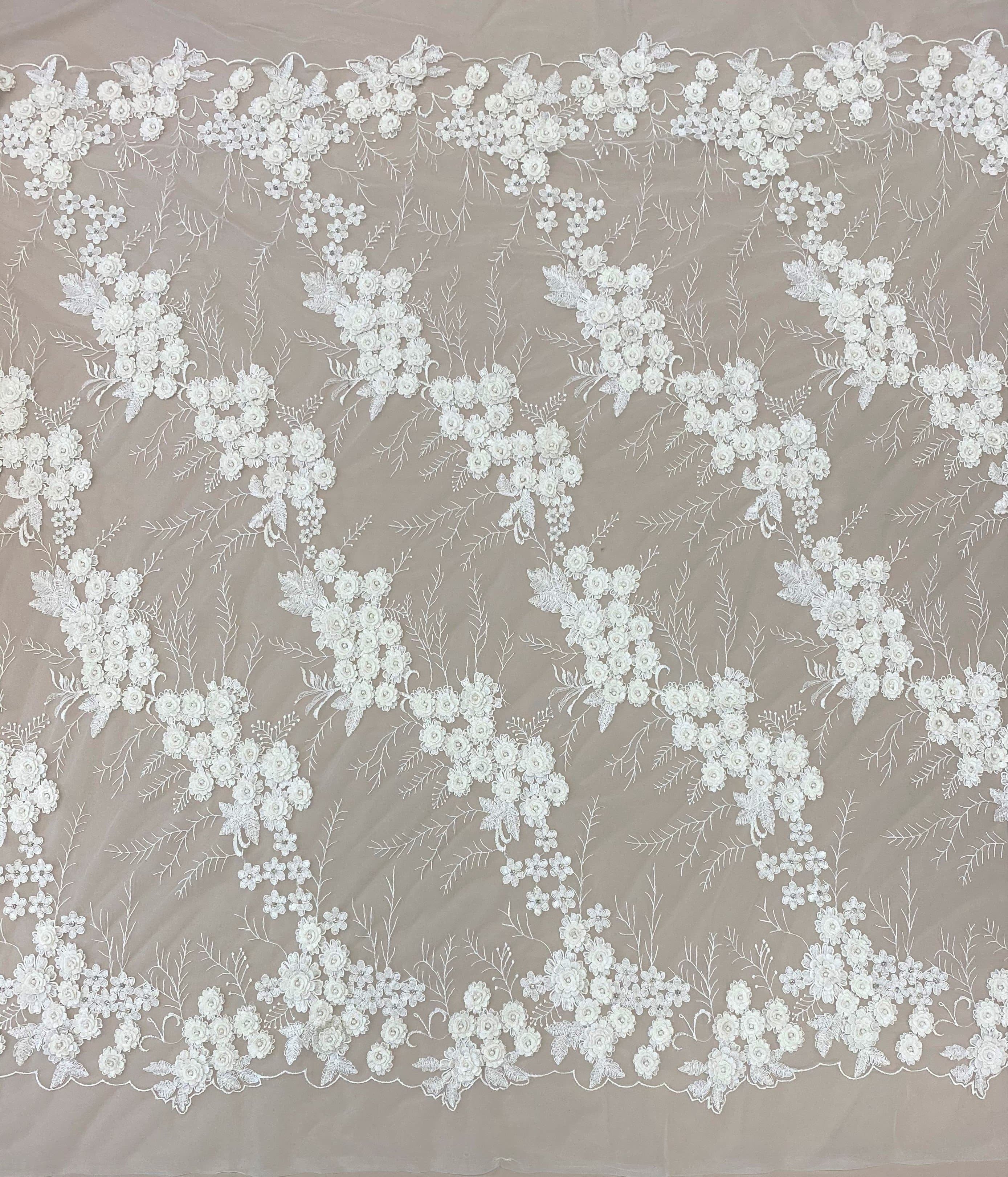 Ivory Embroidered 3D Tulle — featuring floral motifs, a 3D floral design and hand-beading, 50% nylon 50% rayon, 140cm wide