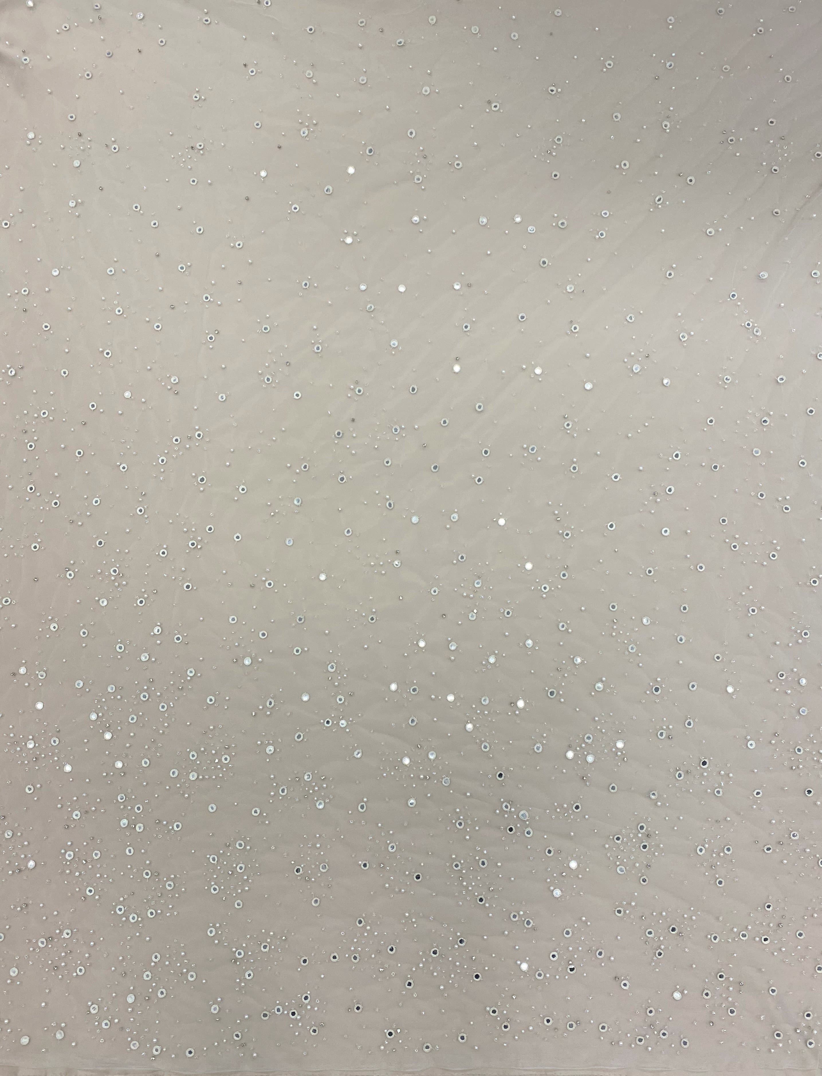 Ivory Embellished Tulle — featuring hand-beading and sequins, 100% nylon, 140cm wide