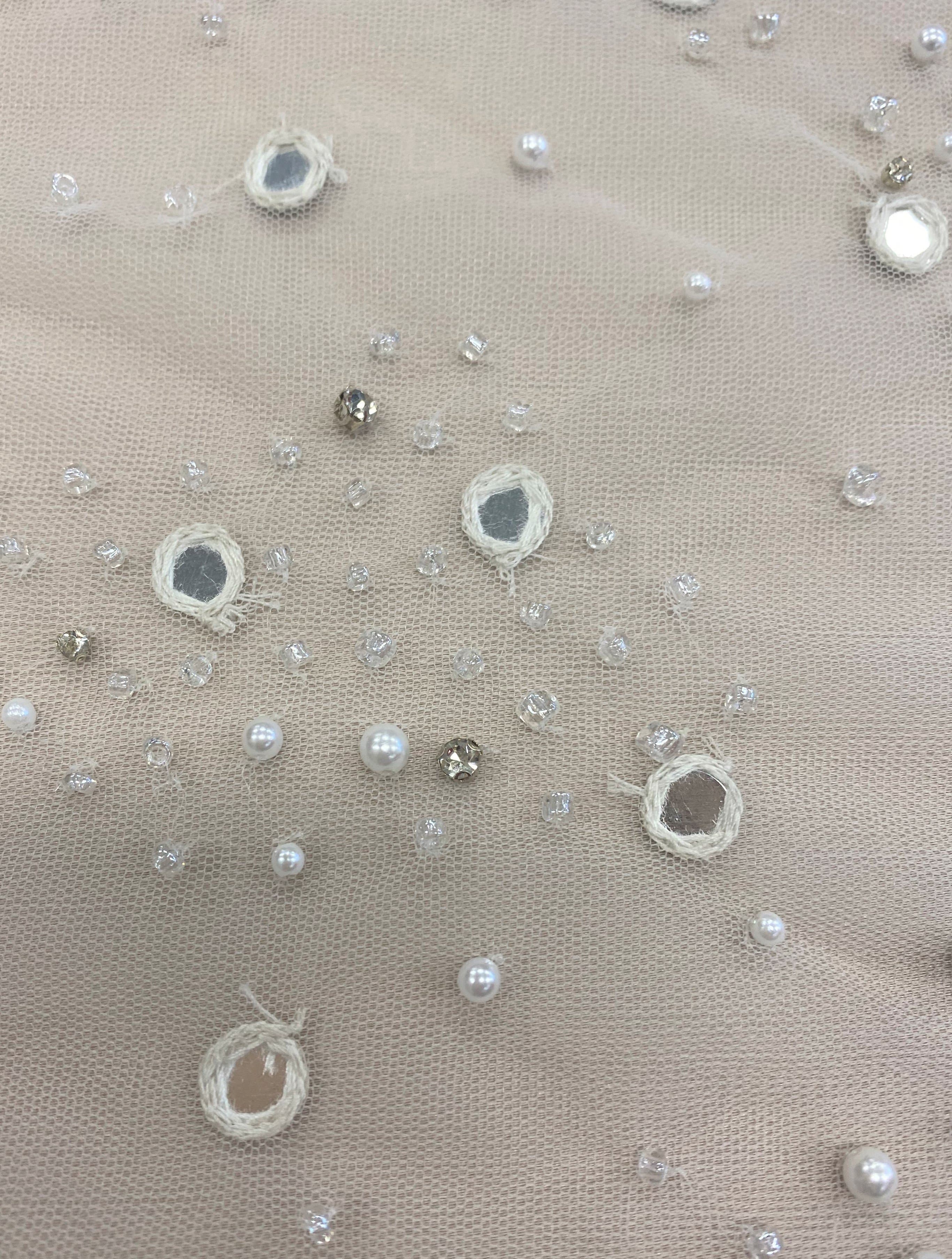 Ivory Embellished Tulle — featuring hand-beading and sequins, 100% nylon, 140cm wide