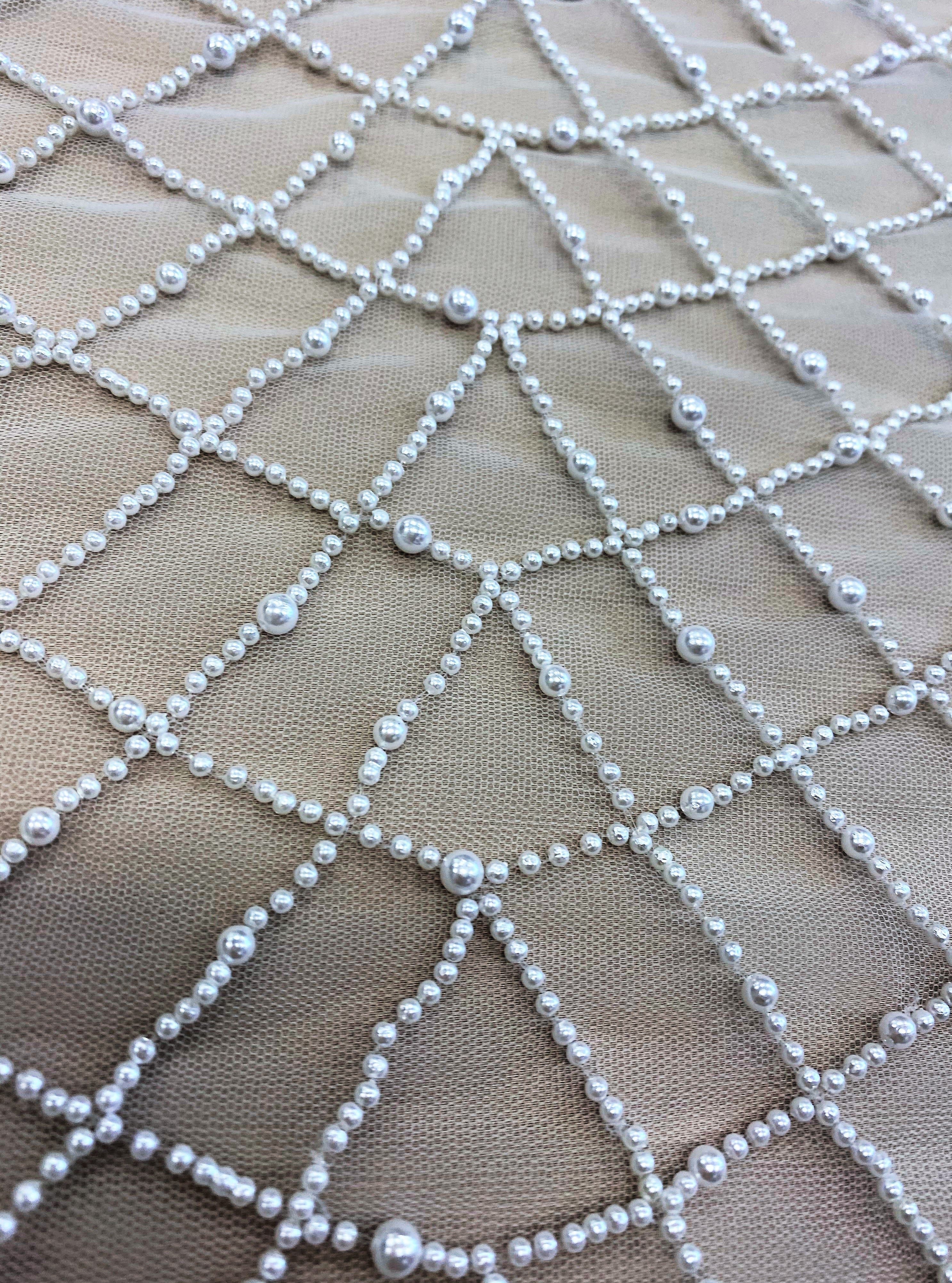 Ivory Embellished Tulle — featuring hand-beading, 100% polyester, 140cm wide