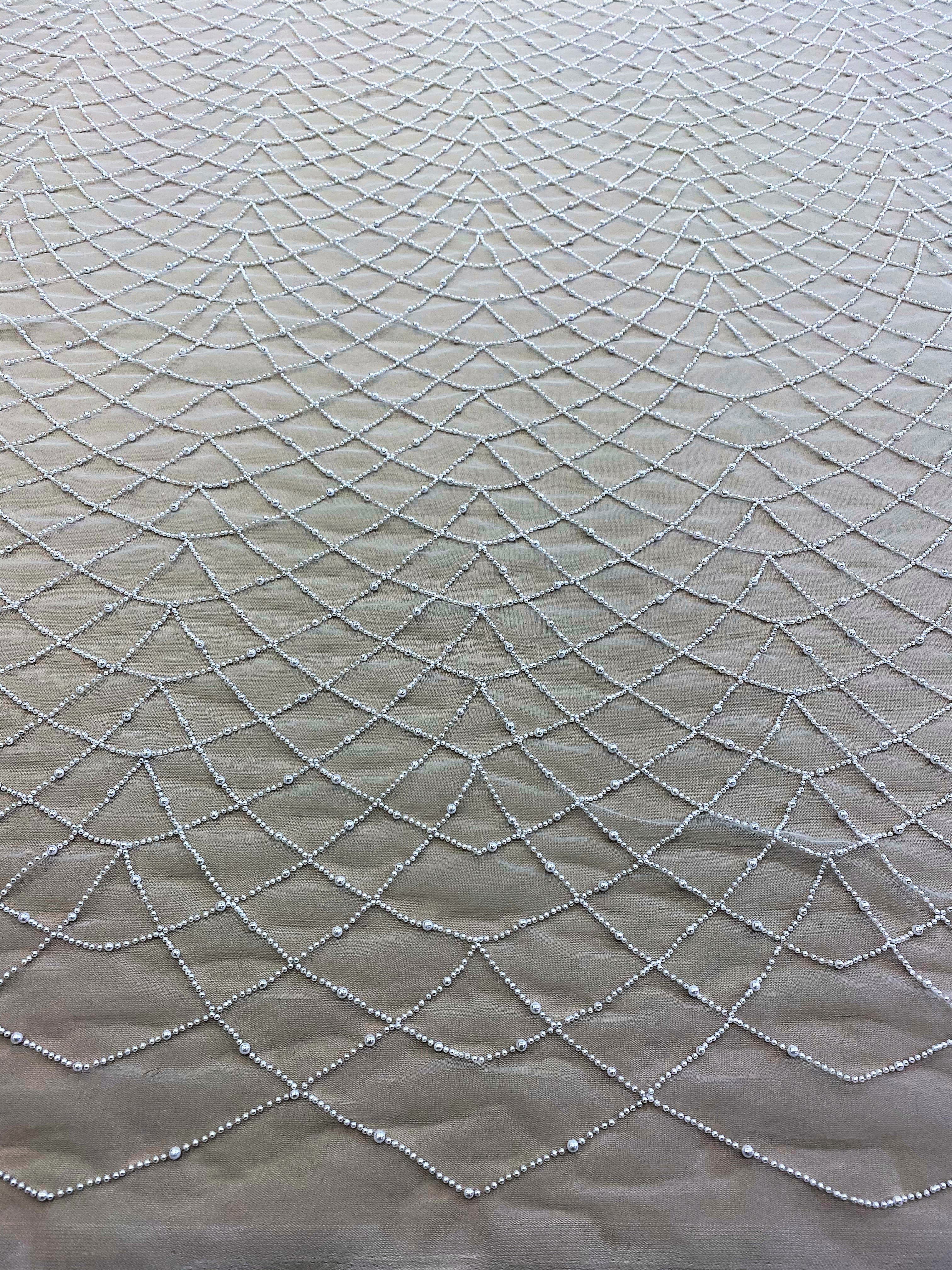 Ivory Embellished Tulle — featuring hand-beading, 100% polyester, 140cm wide