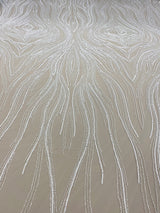Ivory Embellished Tulle — featuring scalloped edges, hand-beading and sequins, 100% nylon, 140cm wide