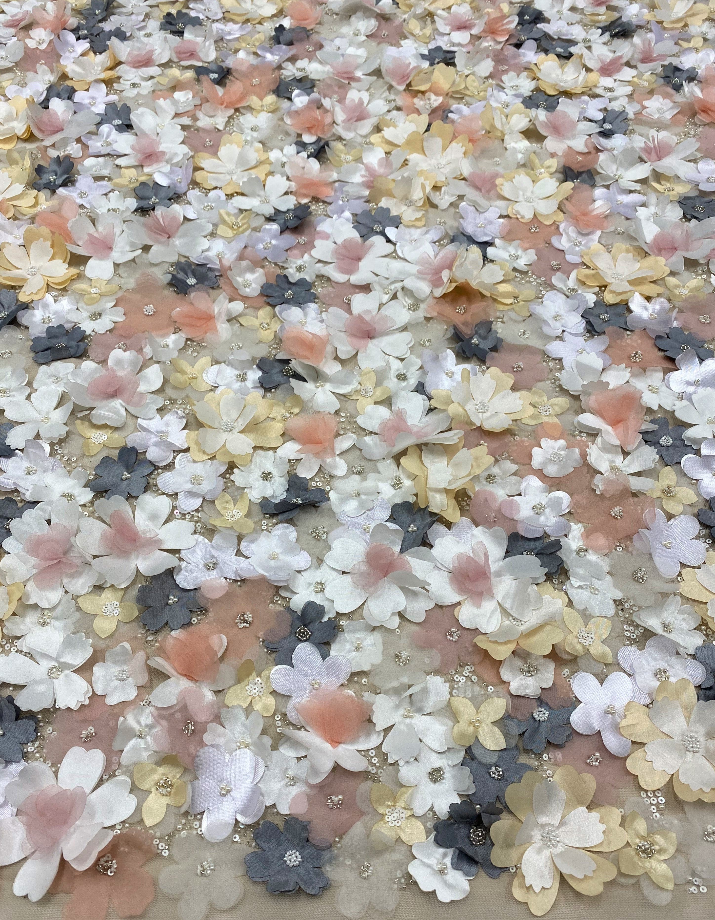 Multi Floral Embellished Tulle — featuring floral motifs, a 3D floral design and hand-beading, 100% polyamide, 105cm wide