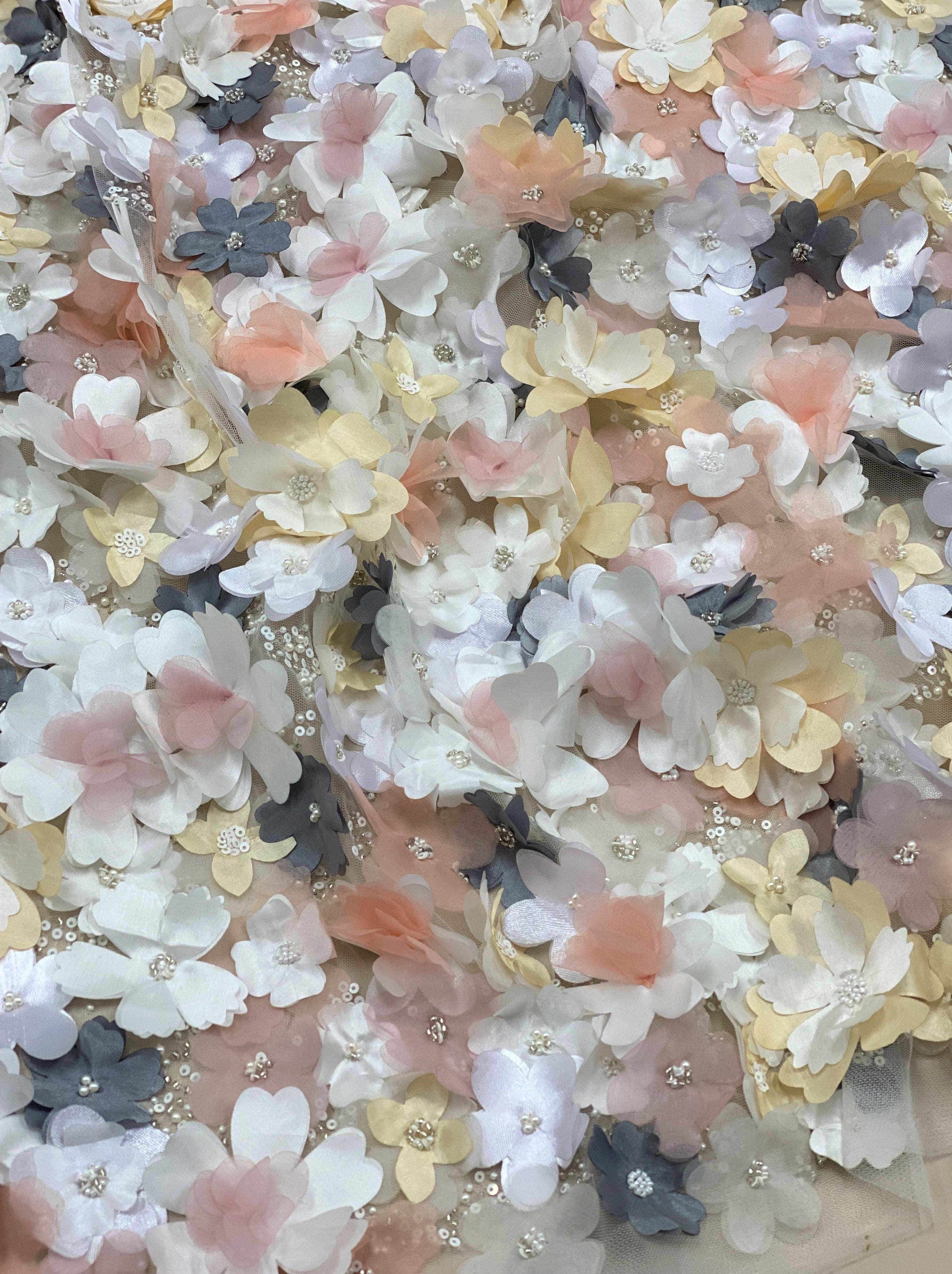 Multi Floral Embellished Tulle — featuring floral motifs, a 3D floral design and hand-beading, 100% polyamide, 105cm wide