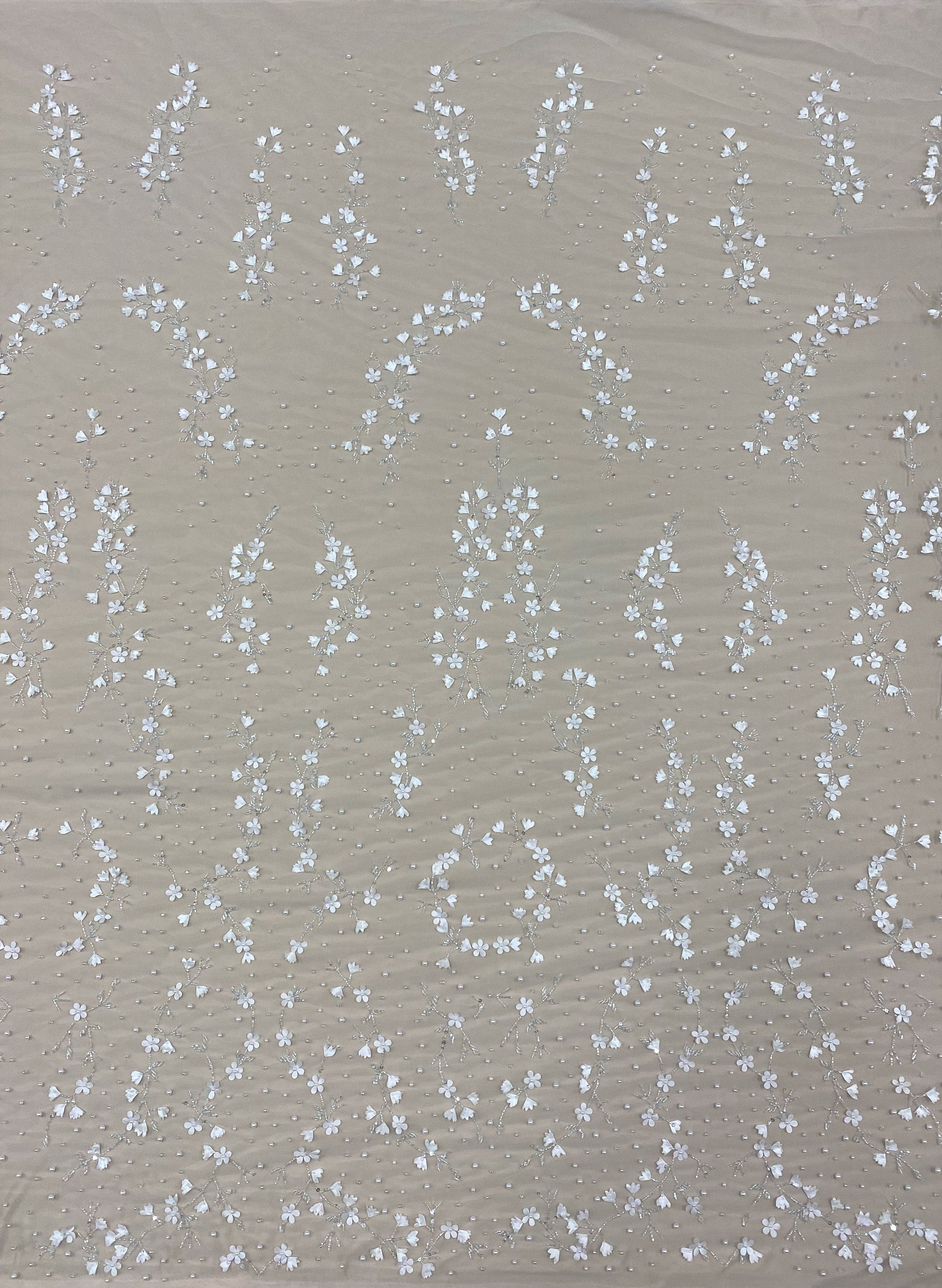 Ivory 3D Floral Embellished Tulle — featuring floral motifs and hand-beading, 100% polyamide, 140cm wide