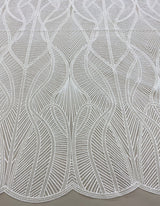 Ivory Embroidered Tulle — featuring scalloped edges and a corded texture, 50% nylon 50% rayon, 130cm wide