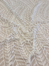 Ivory Embroidered Tulle — soft, 50% nylon 50% rayon, 130cm wide