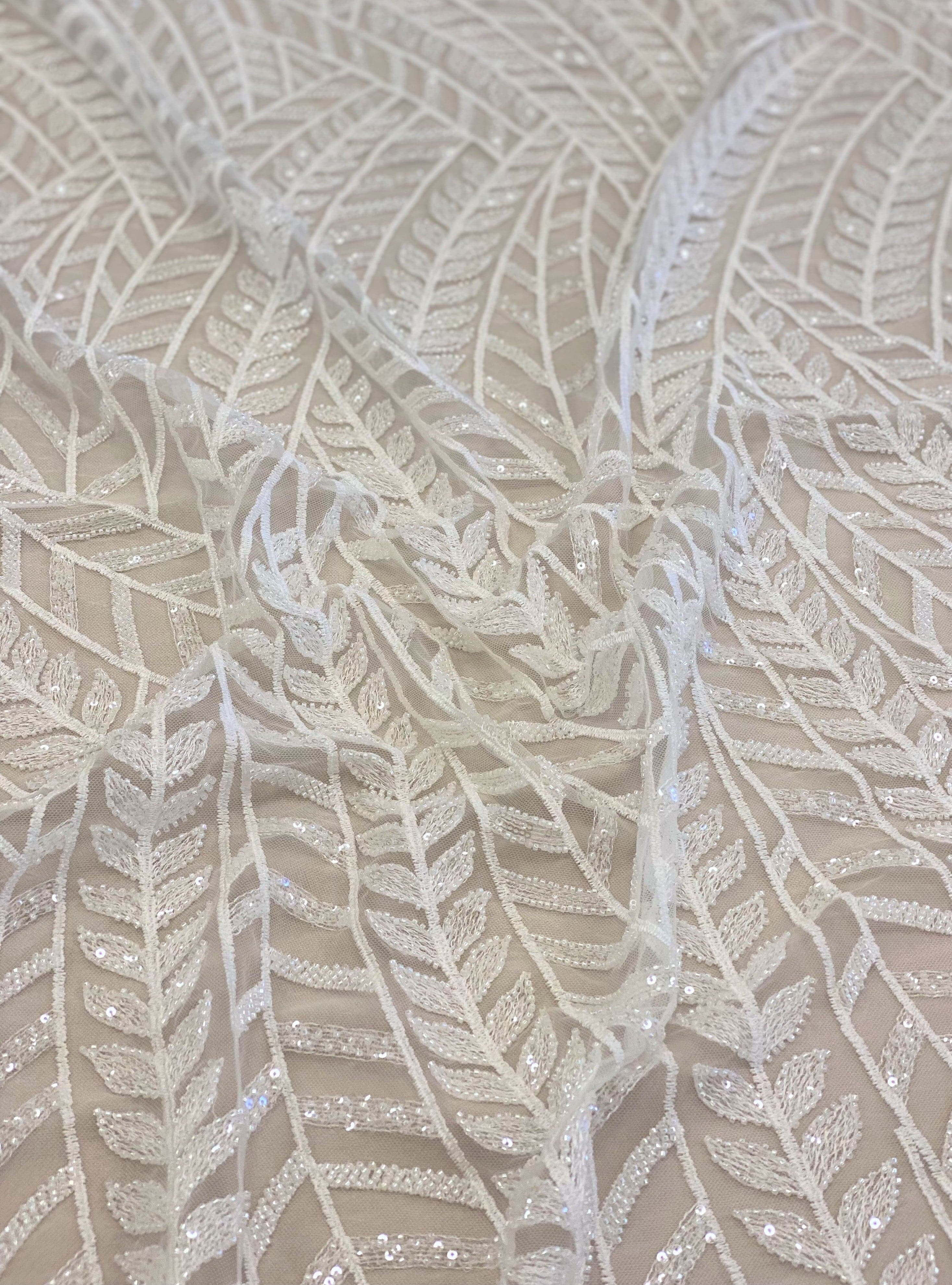 Ivory Embroidered Tulle — soft, 50% nylon 50% rayon, 130cm wide