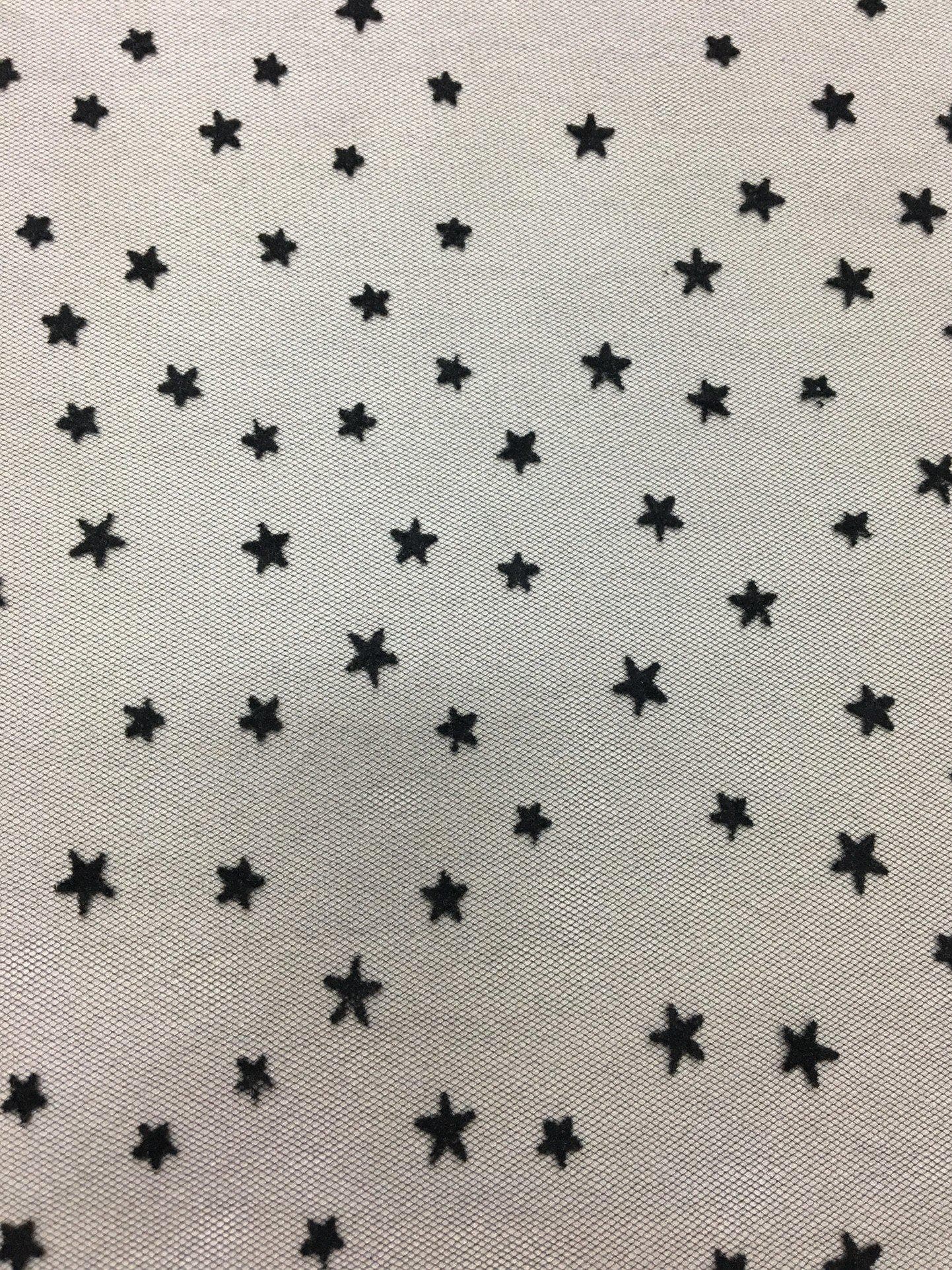 Black Star Tulle — featuring a flocked star design, 100% nylon, 150cm wide