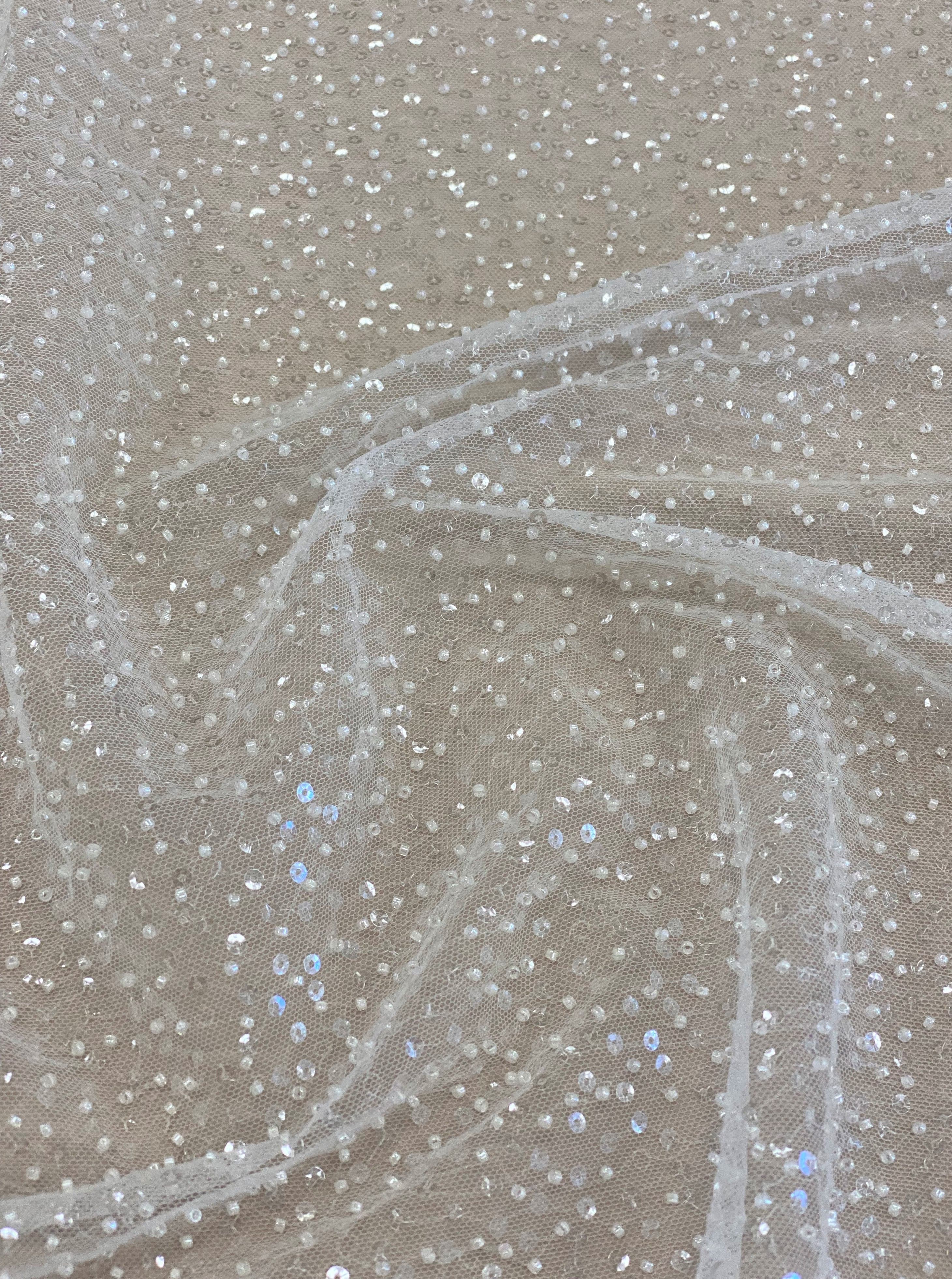 Ivory Sequin Tulle — featuring hand-beading and sequins, 100% nylon, 110cm wide