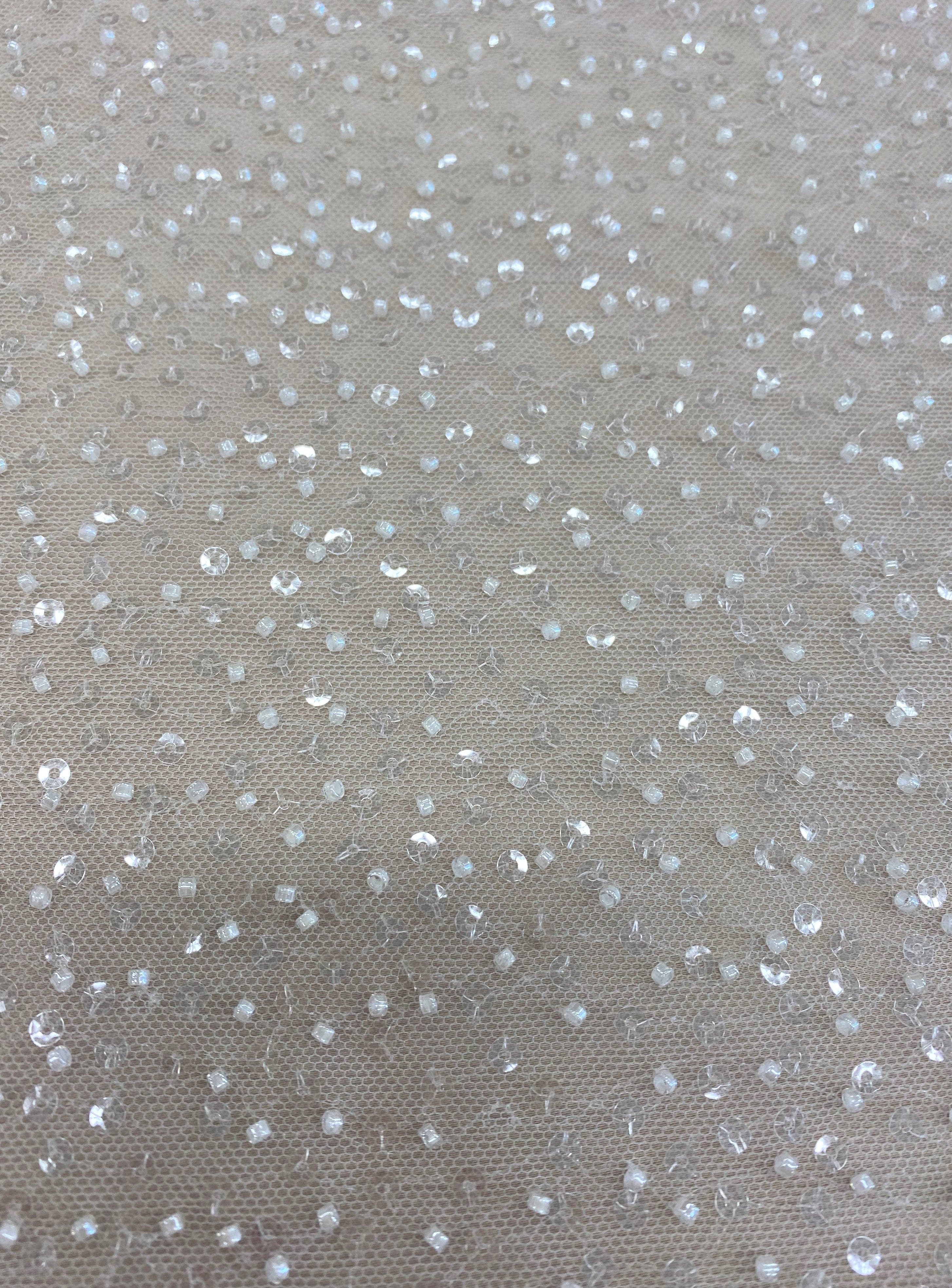 Ivory Sequin Tulle — featuring hand-beading and sequins, 100% nylon, 110cm wide